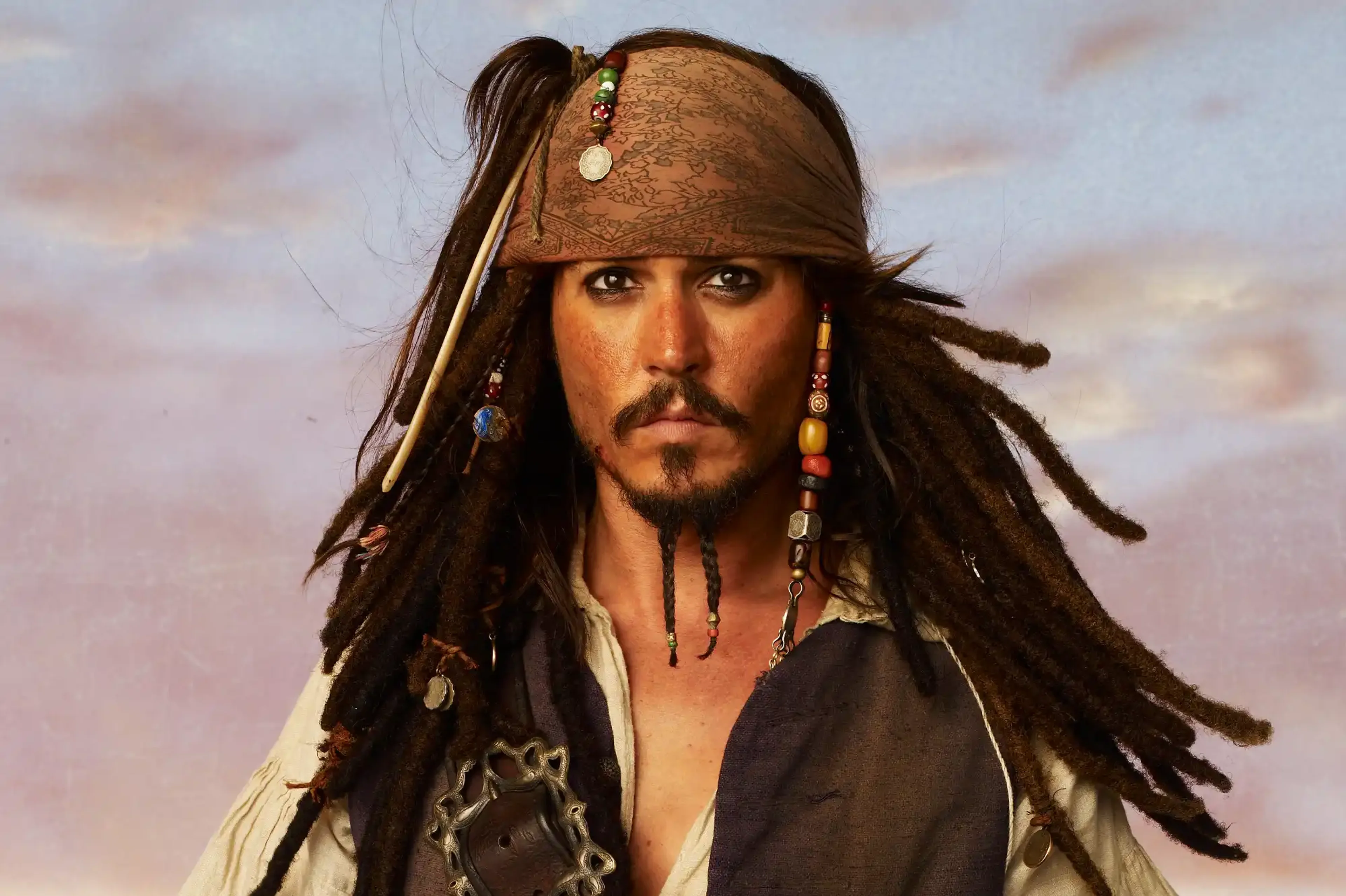 Jack Sparrow looks out from a ship in Pirates of the Caribbean: At World’s End.