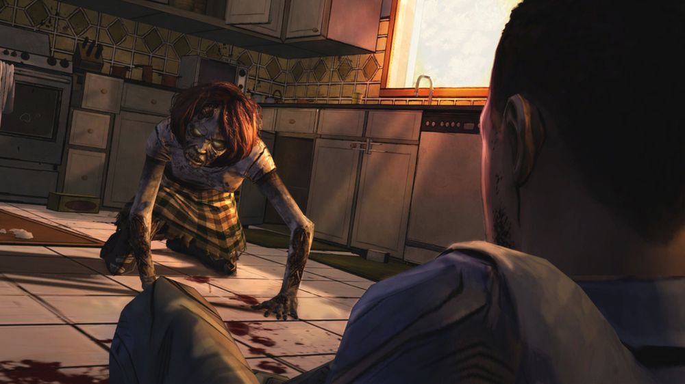 A walker crawls toward Lee Everett across a kitchen floor.