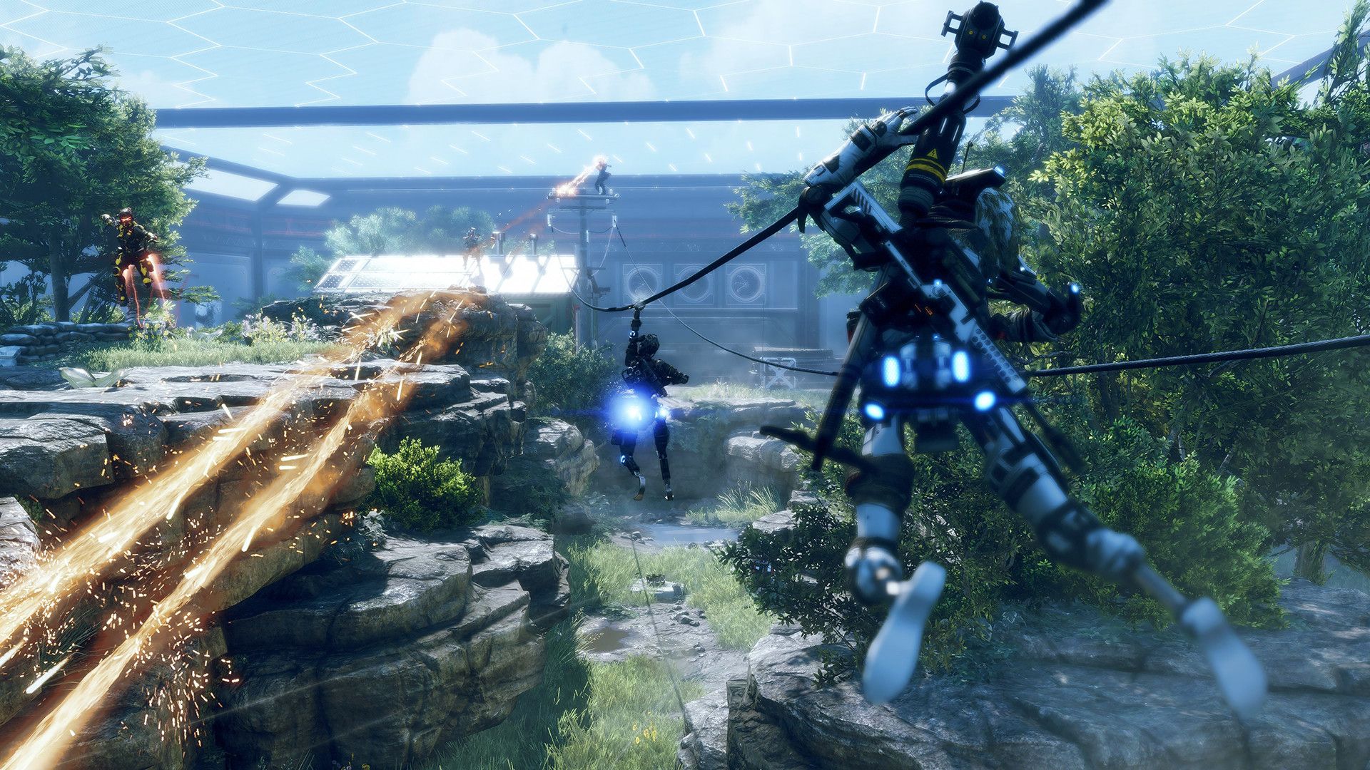A Pilot uses a cable high above a forest battlefield.