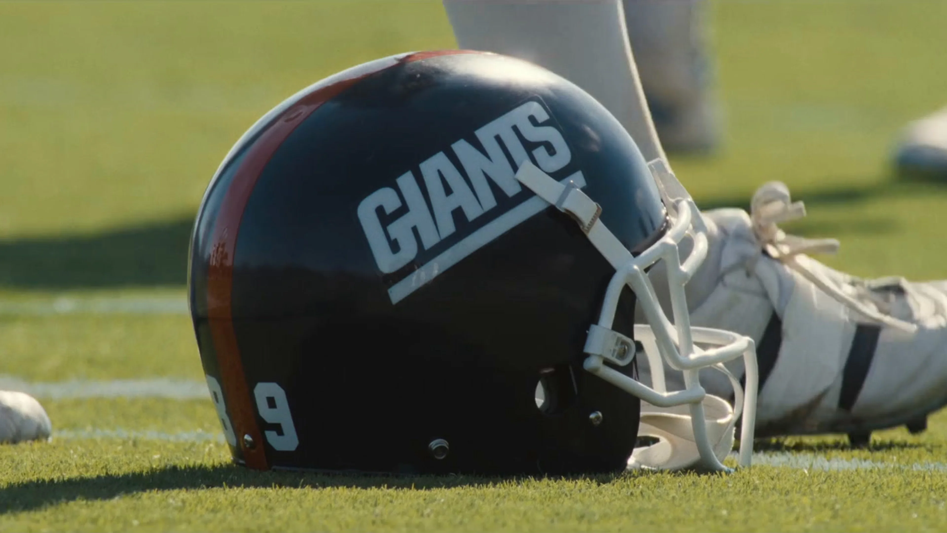 A New York Giants helmet rests on the practice field in Mr. Irrelevant.