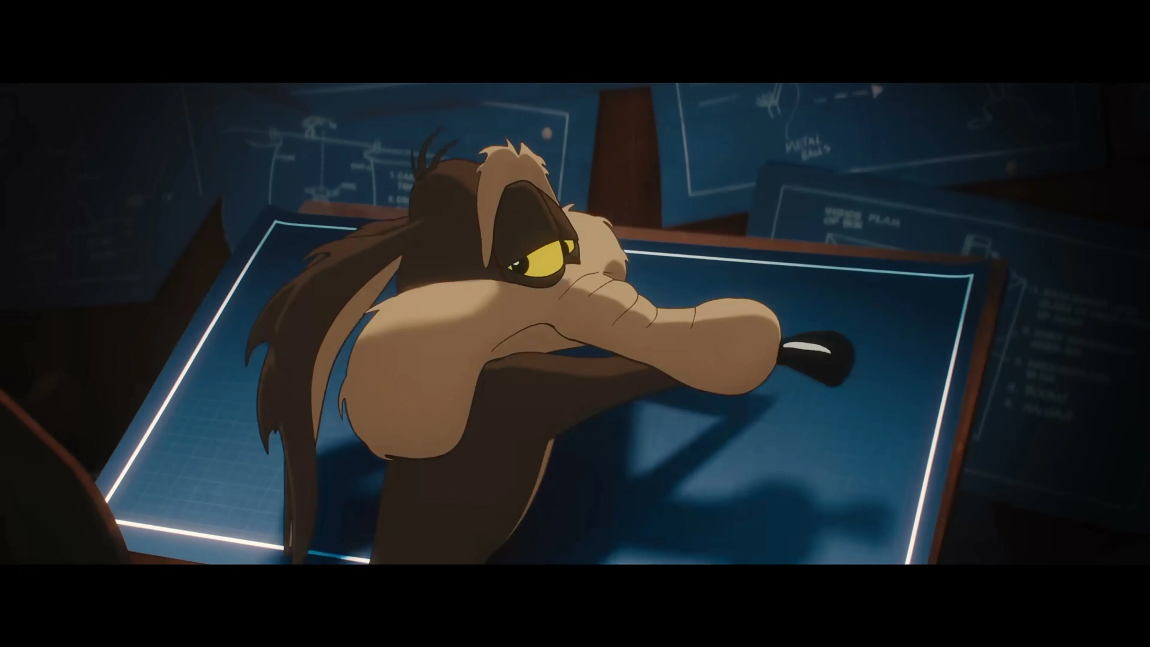 Wile E. Coyote studies Acme evidence on a glowing display in Coyote vs. Acme.