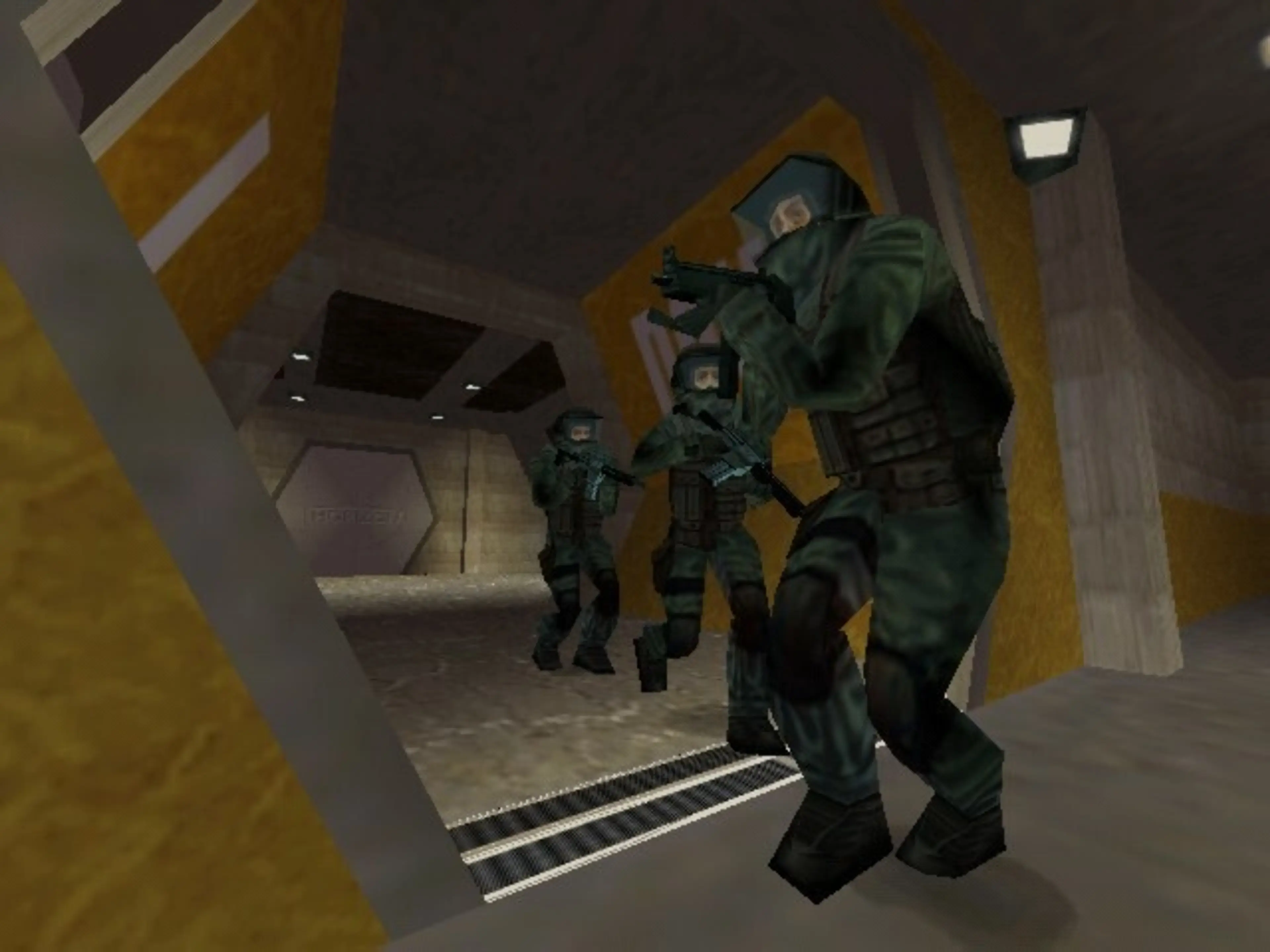Rainbow operatives move through an interior.