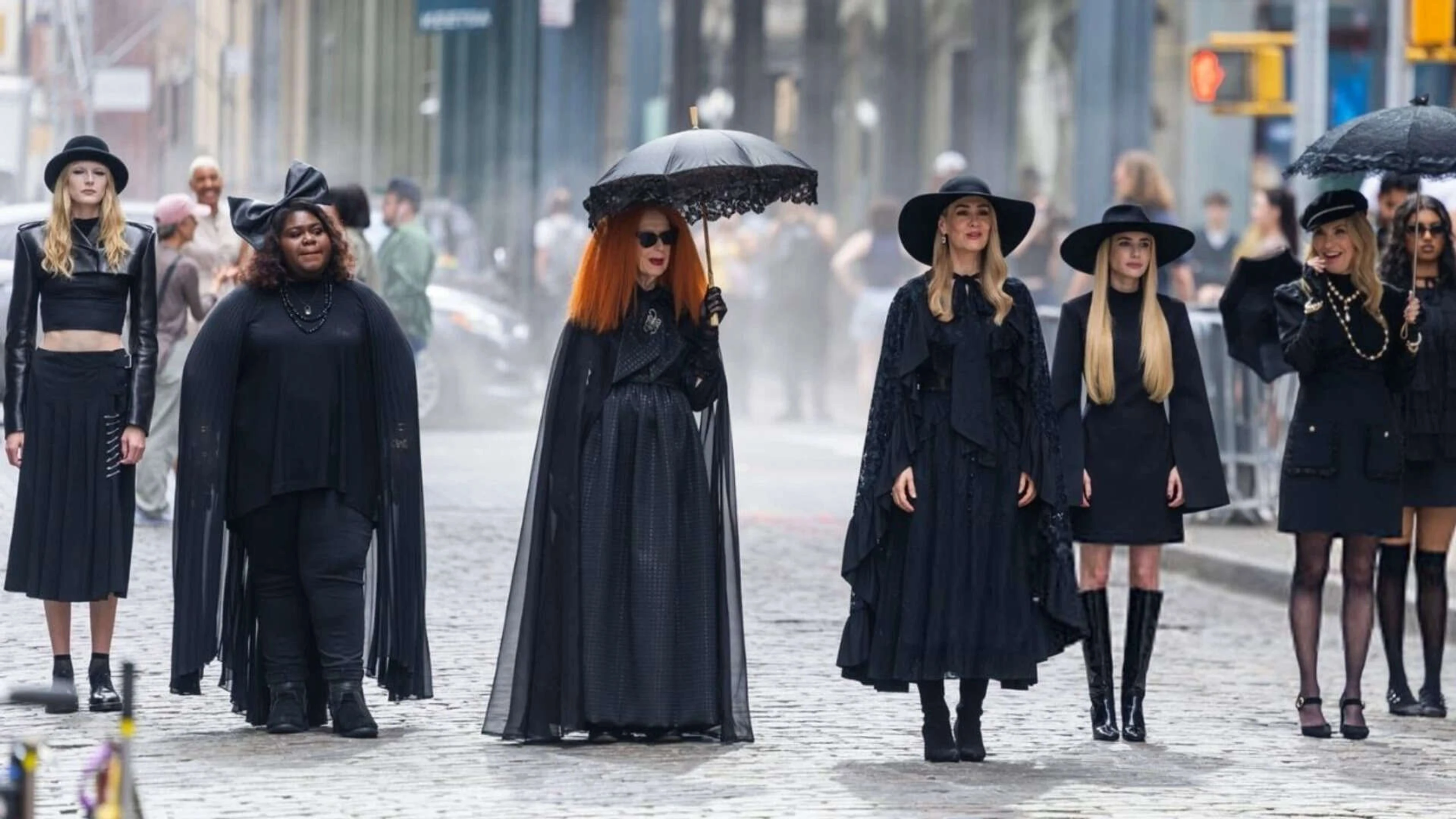 The returning witches walk together in the American Horror Story Season 13 trailer.