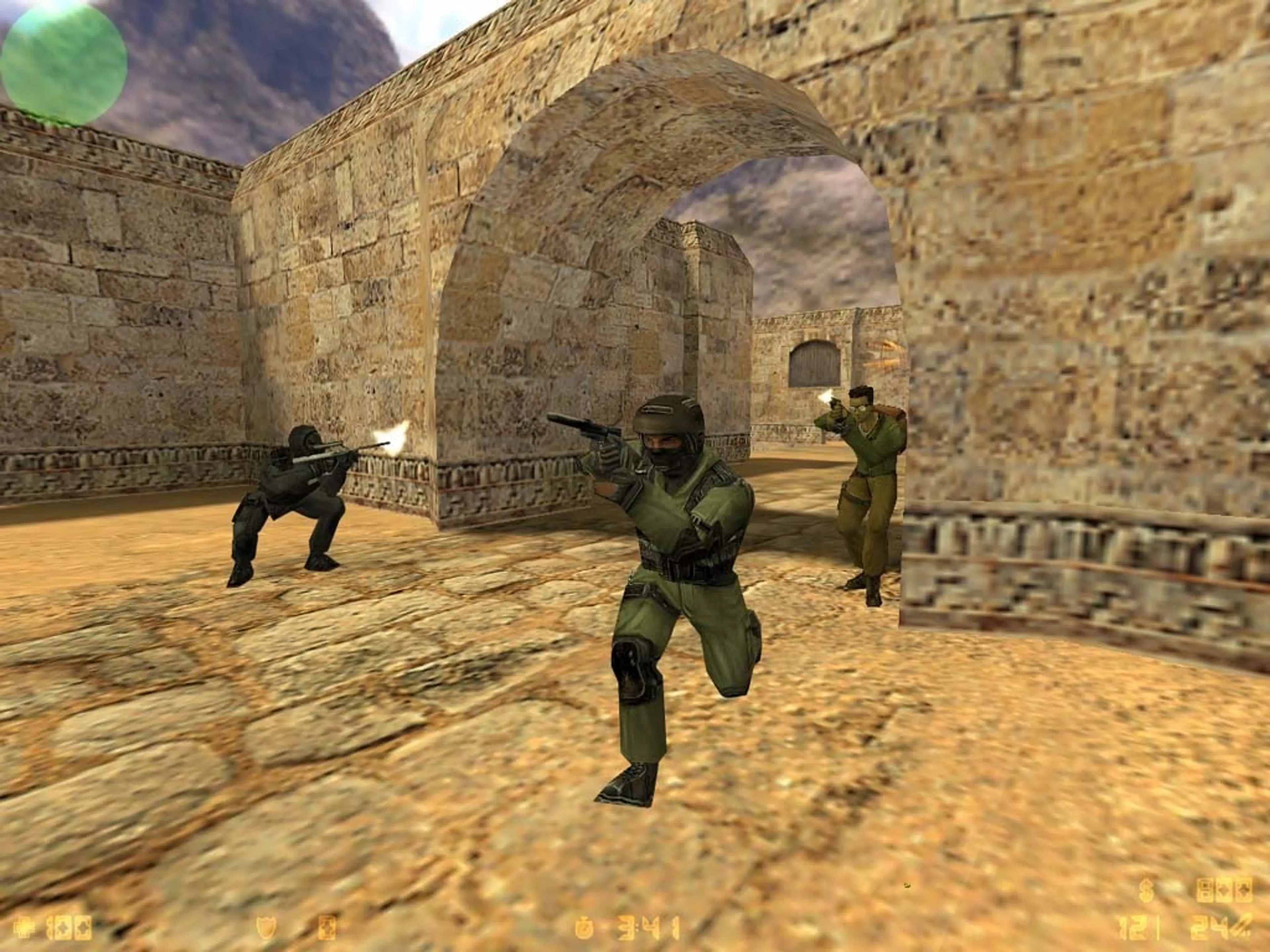 Players move through a desert map in Counter-Strike.