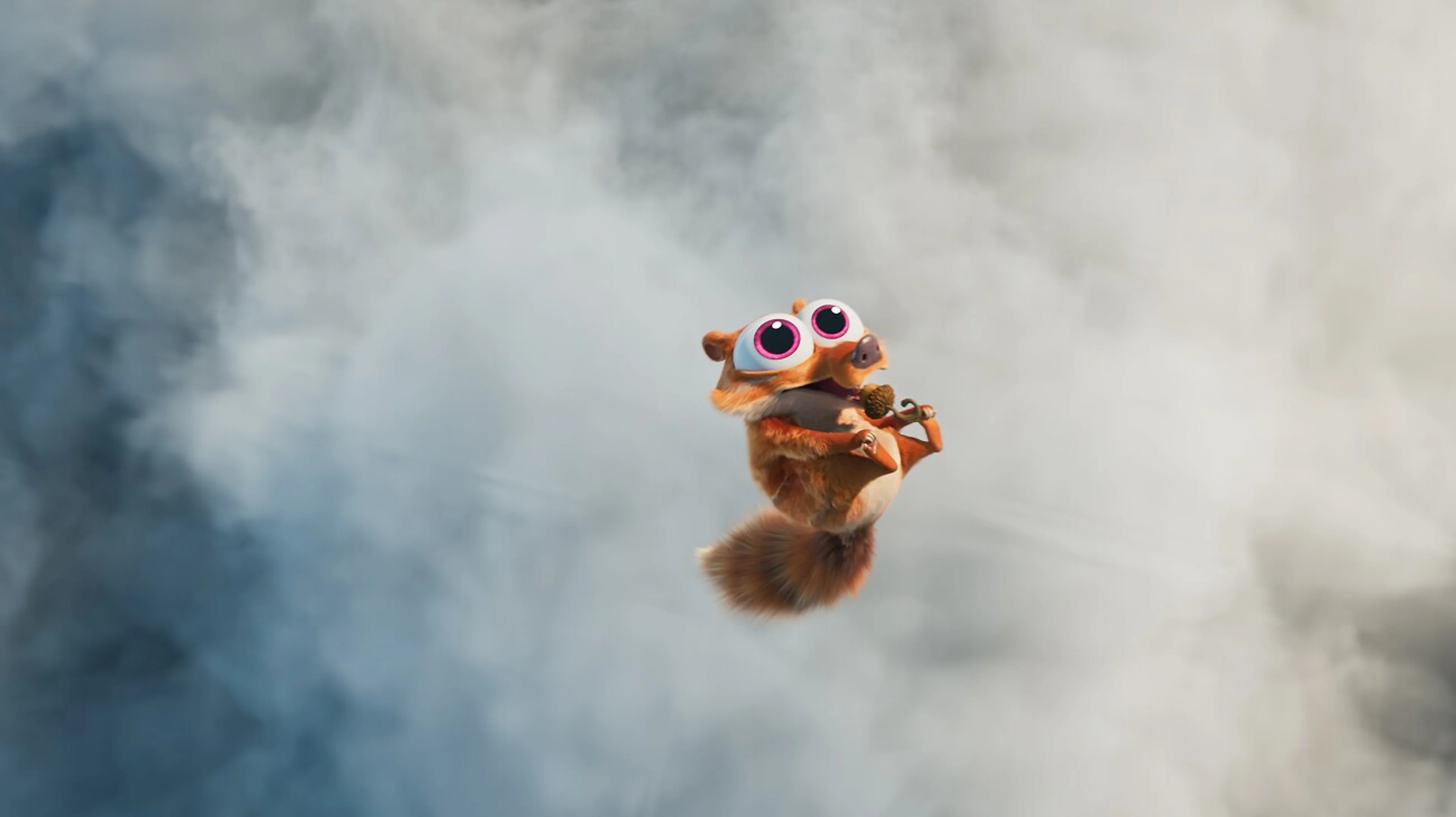 Baby Scrat floats through the air while clutching an acorn in an official Ice Age: Boiling Point still.
