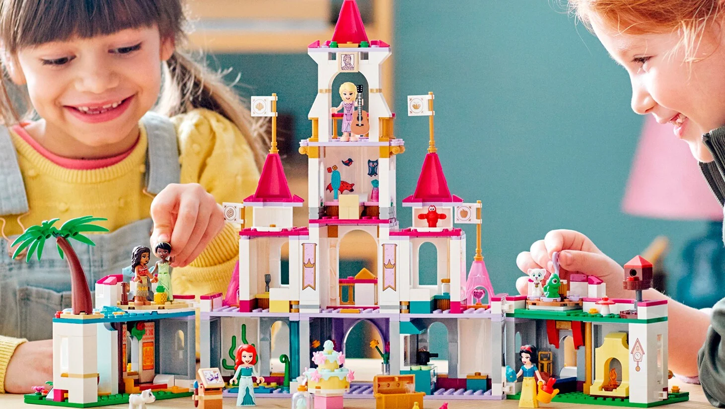 Children play with a set featuring several Disney Princess characters