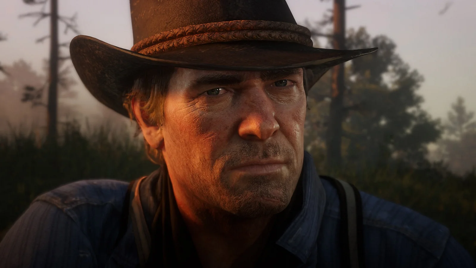 Arthur Morgan standing outdoors in Red Dead Redemption 2.