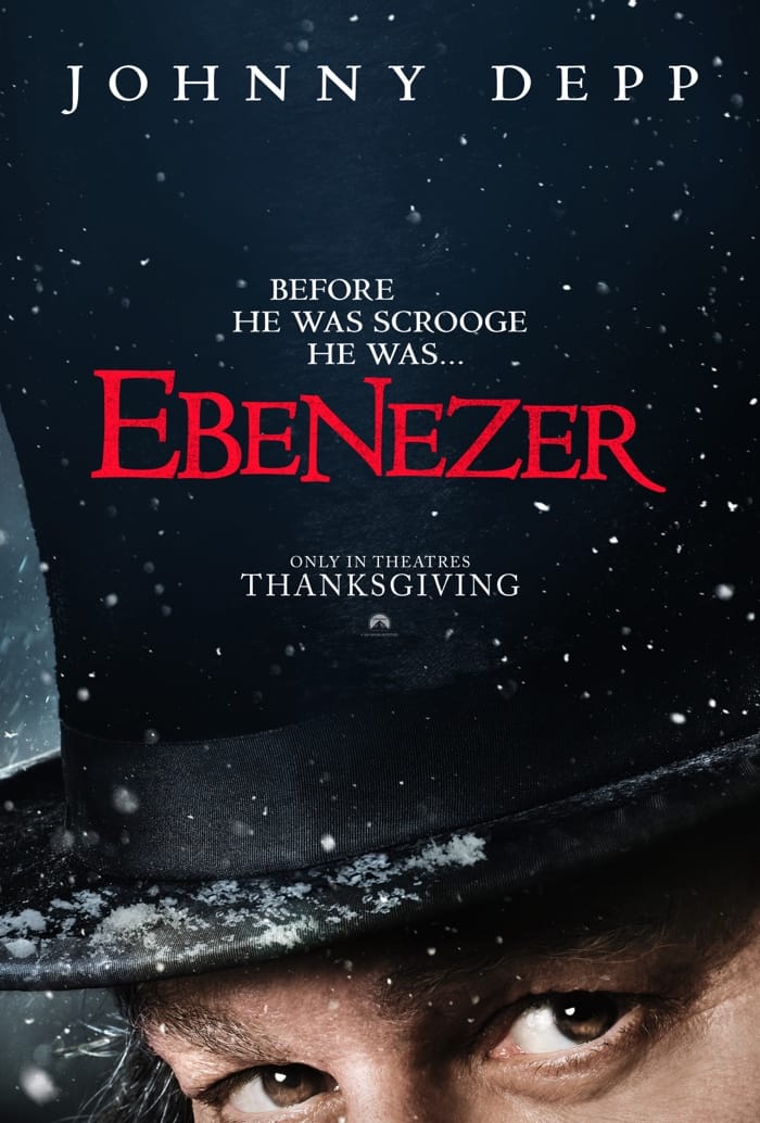 Official early Ebenezer poster shows Johnny Depp’s eyes under a snow-covered top hat.