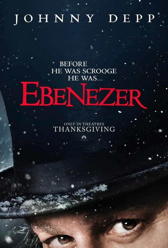 Official early Ebenezer poster shows Johnny Depp’s eyes under a snow-covered top hat.