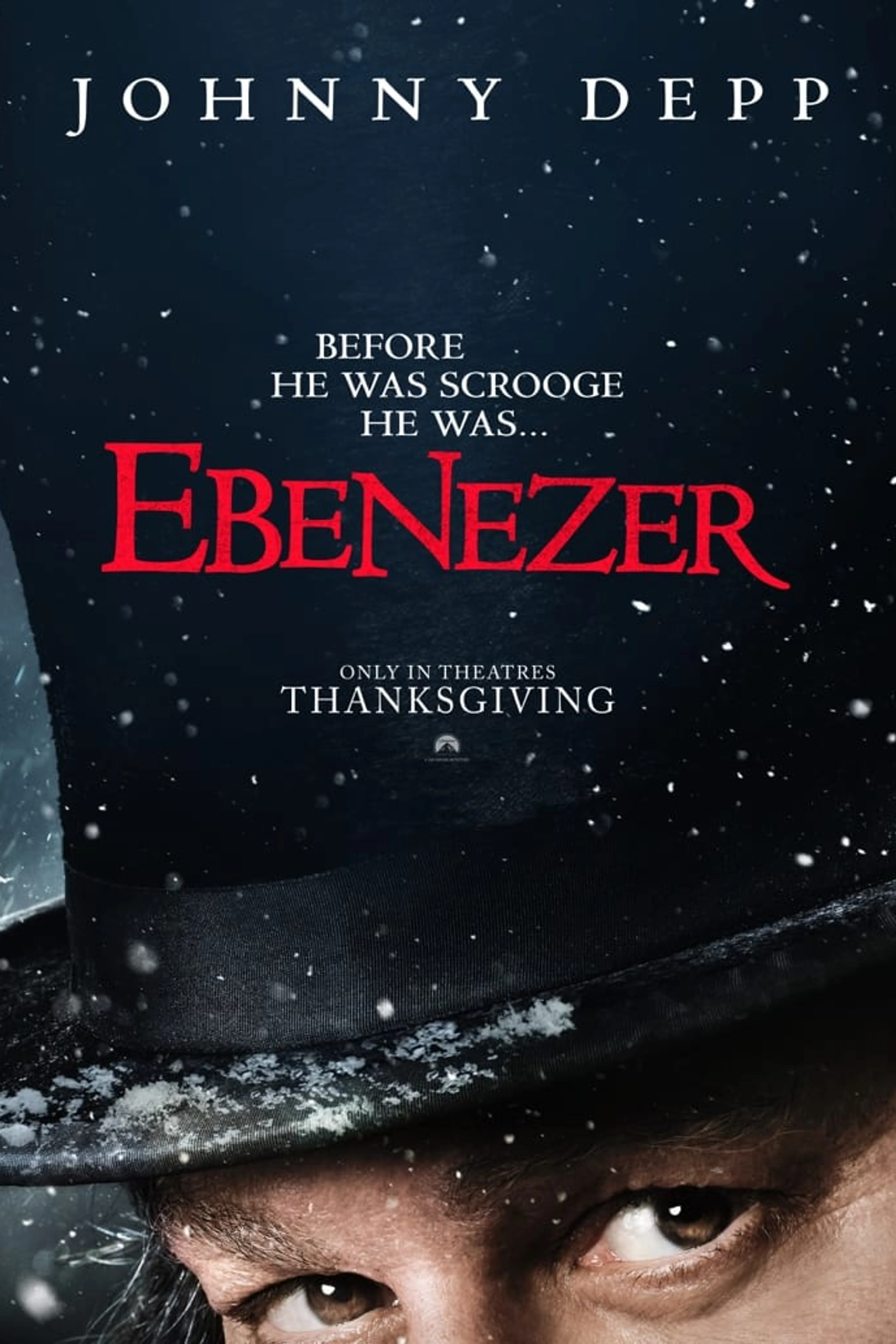 Official early Ebenezer poster shows Johnny Depp’s eyes under a snow-covered top hat.