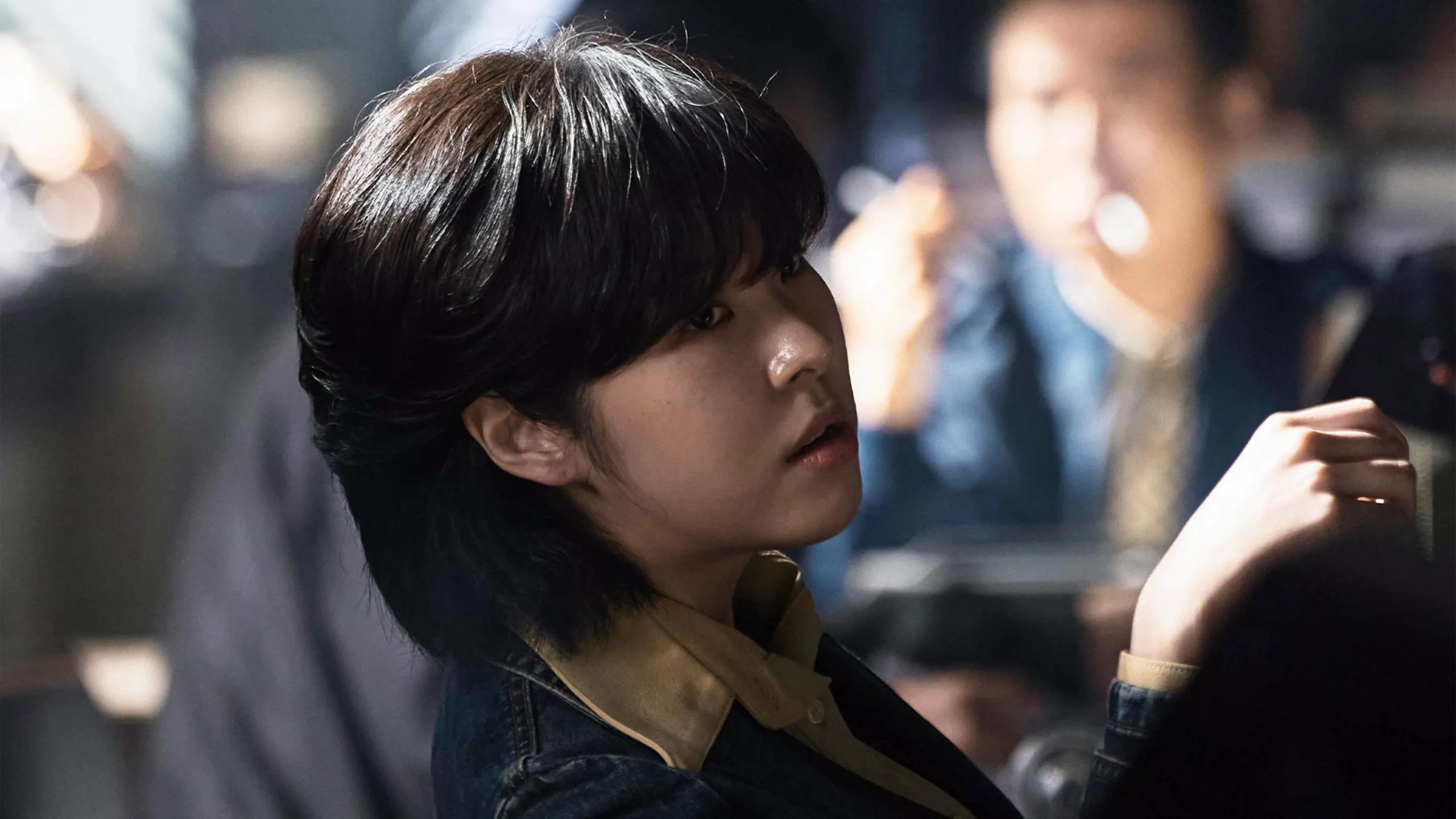 Seo Eun-soo as Ye-jin wears a denim jacket and looks toward someone to her right.