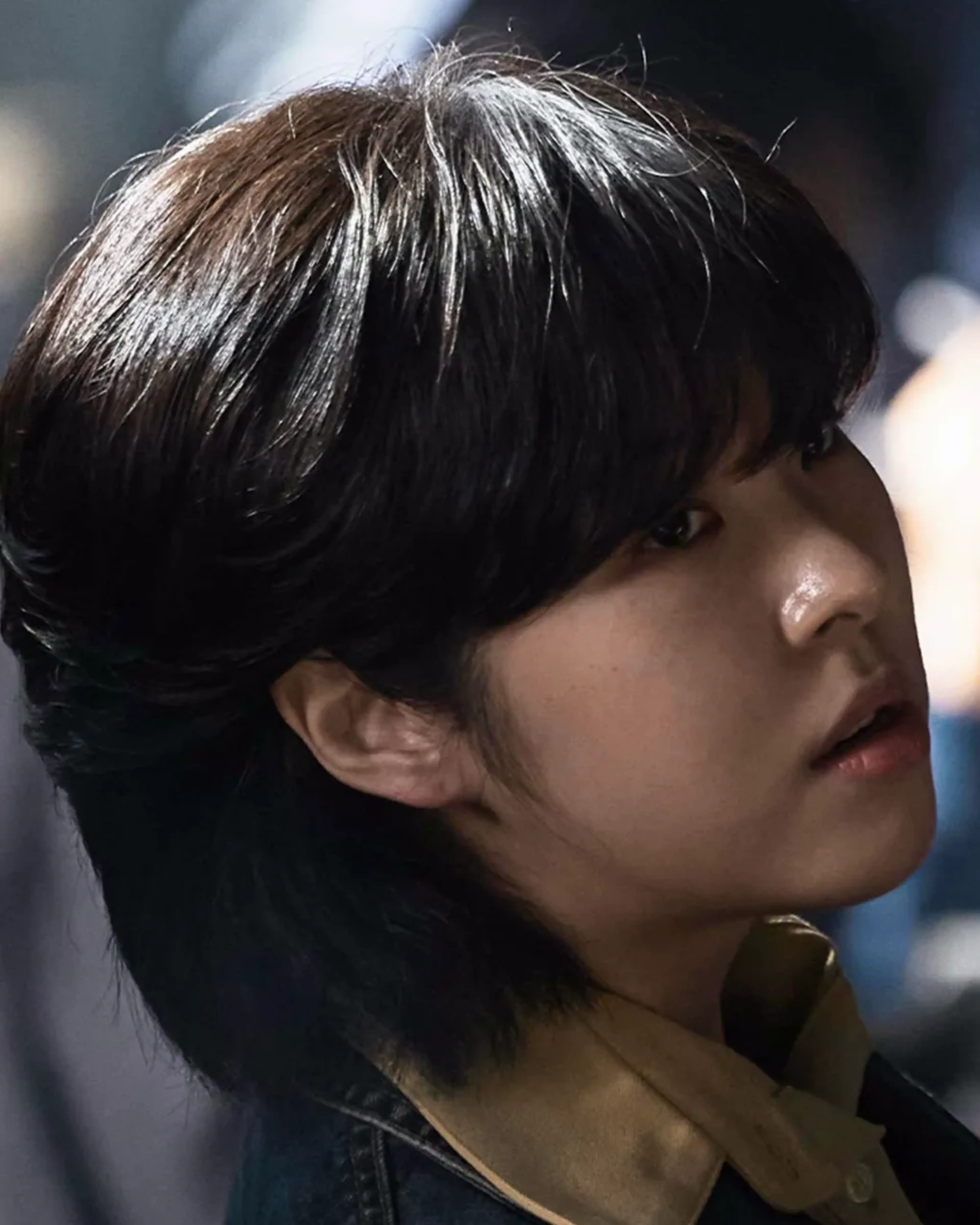 Seo Eun-soo as Ye-jin wears a denim jacket and looks toward someone to her right.
