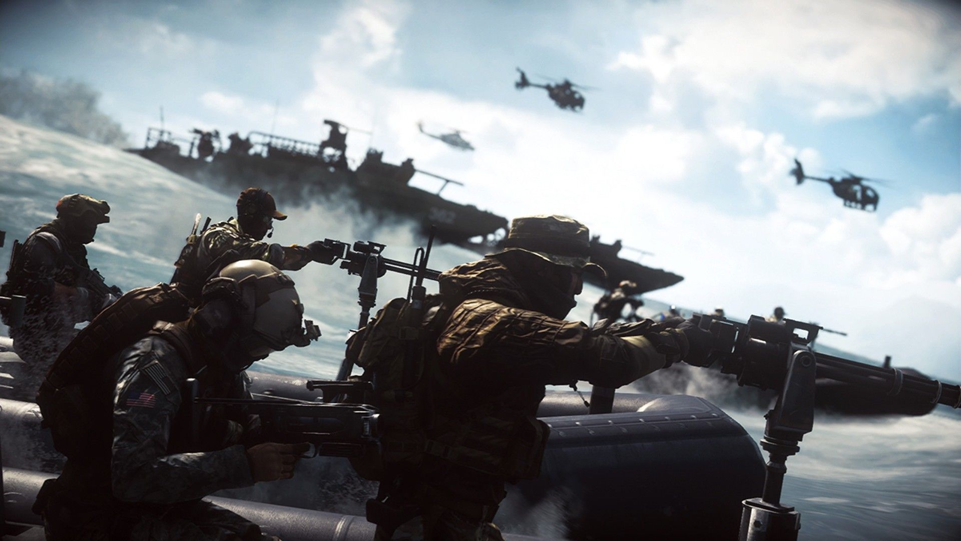 Soldiers ride a small boat toward a large ship while helicopters fly overhead.
