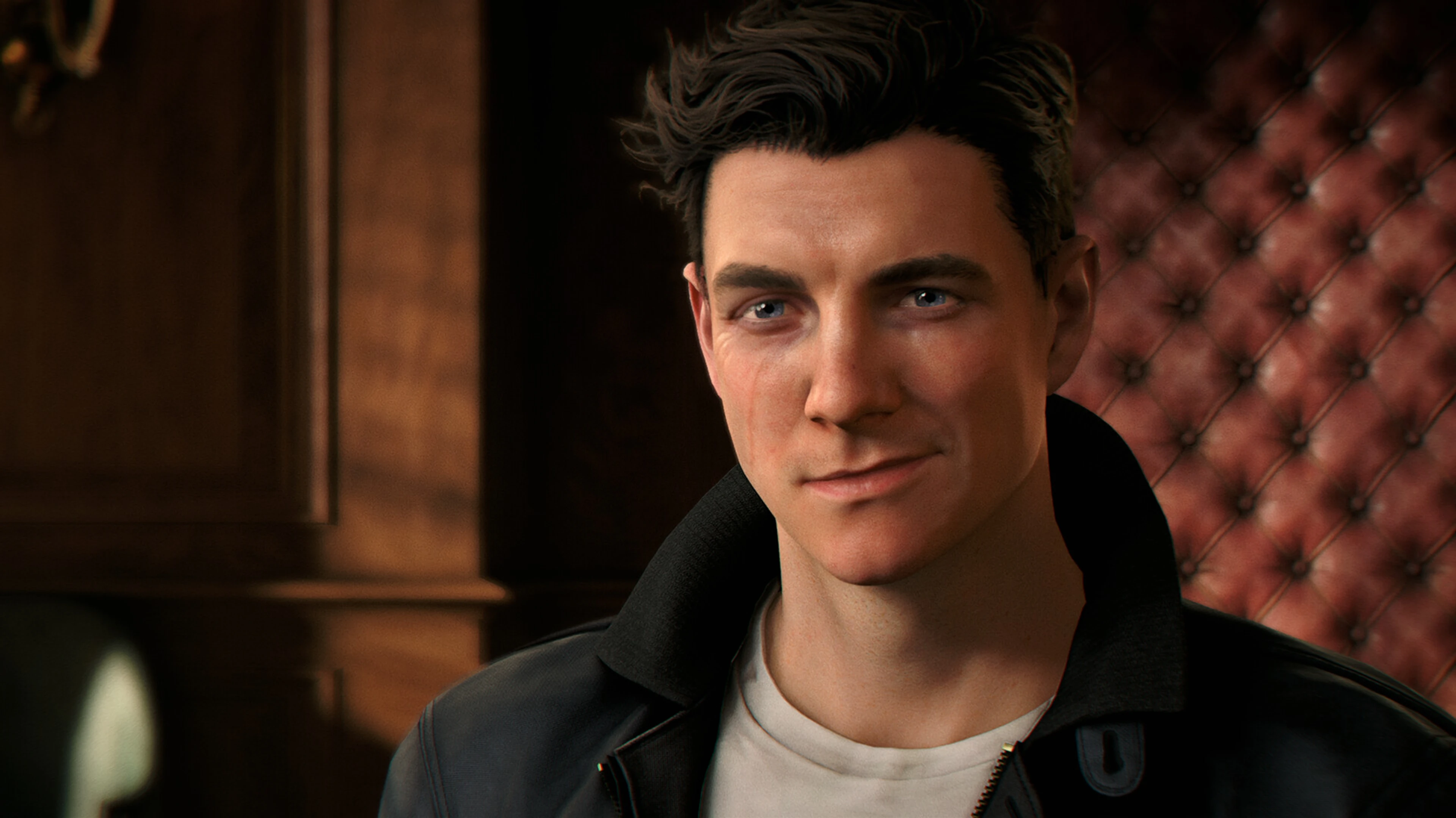 James Bond smiles while wearing a black leather jacket in a wood-paneled room.