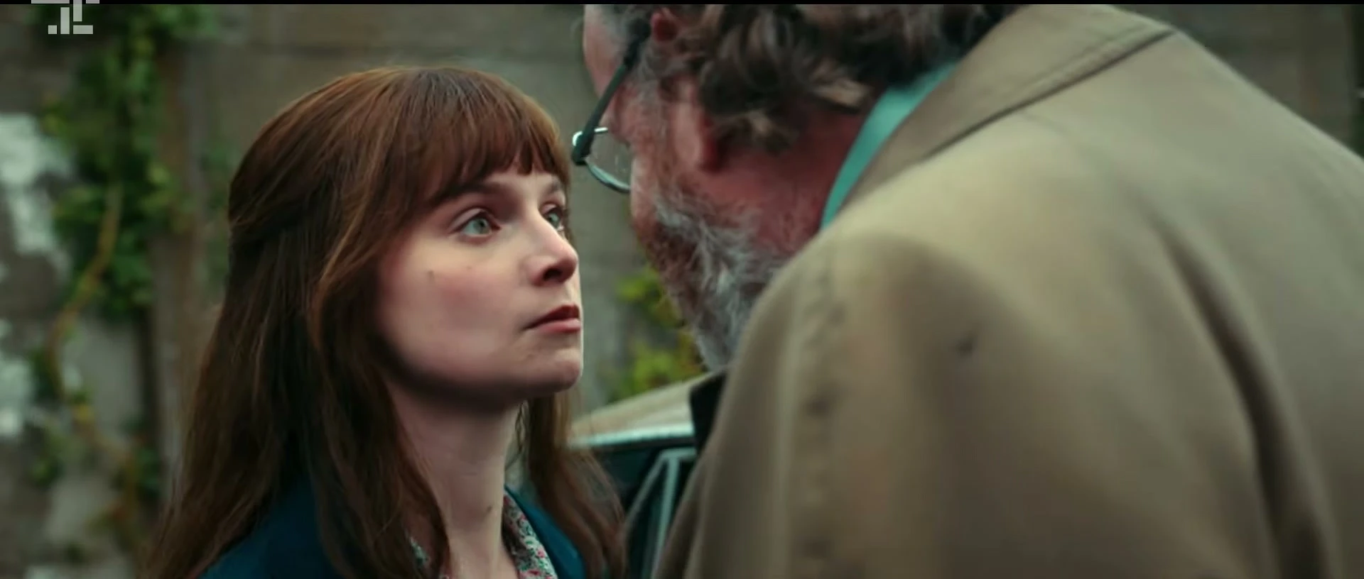 Lola Petticrew looks toward another person as Cushla in Trespasses.