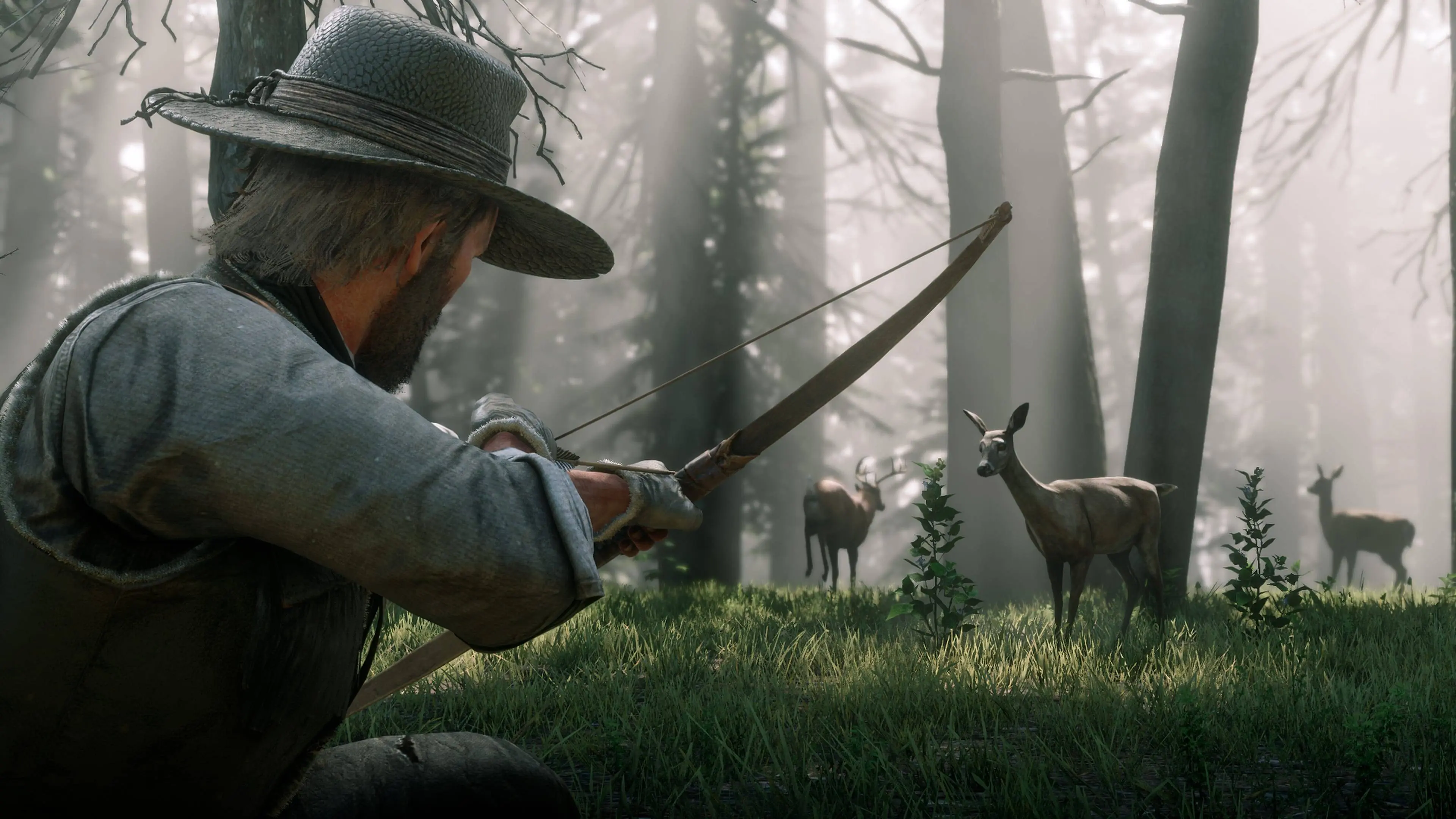 Arthur Morgan aiming a bow at deer in Red Dead Redemption 2