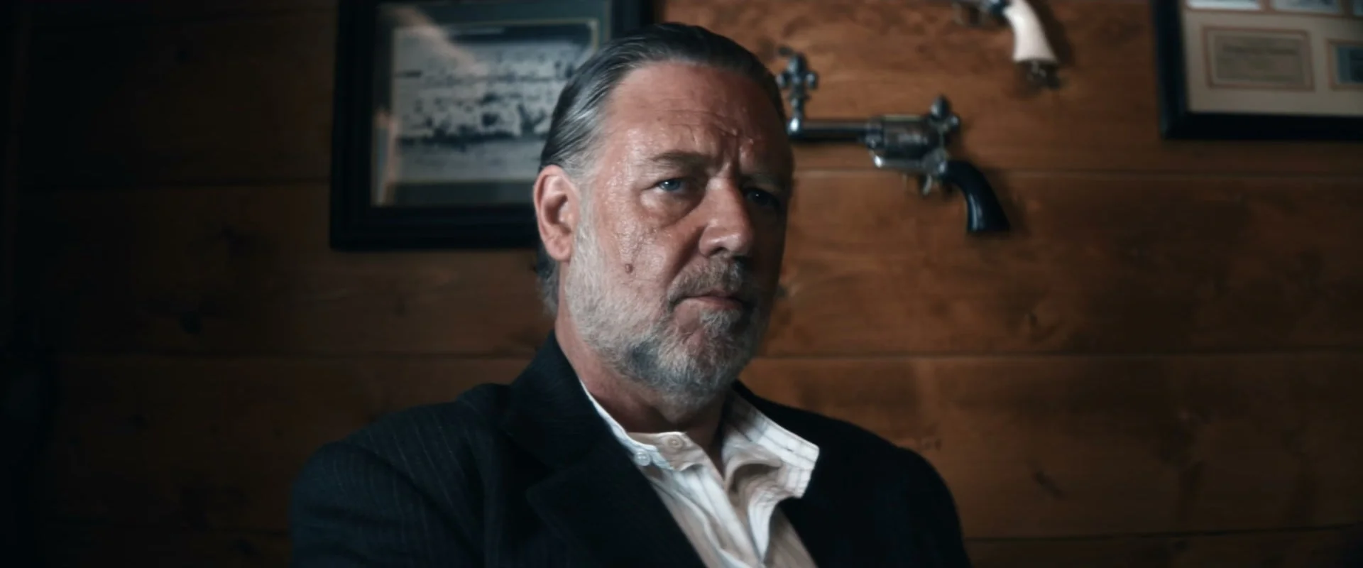 Russell Crowe appears as prison warden Clancy in The Weight.