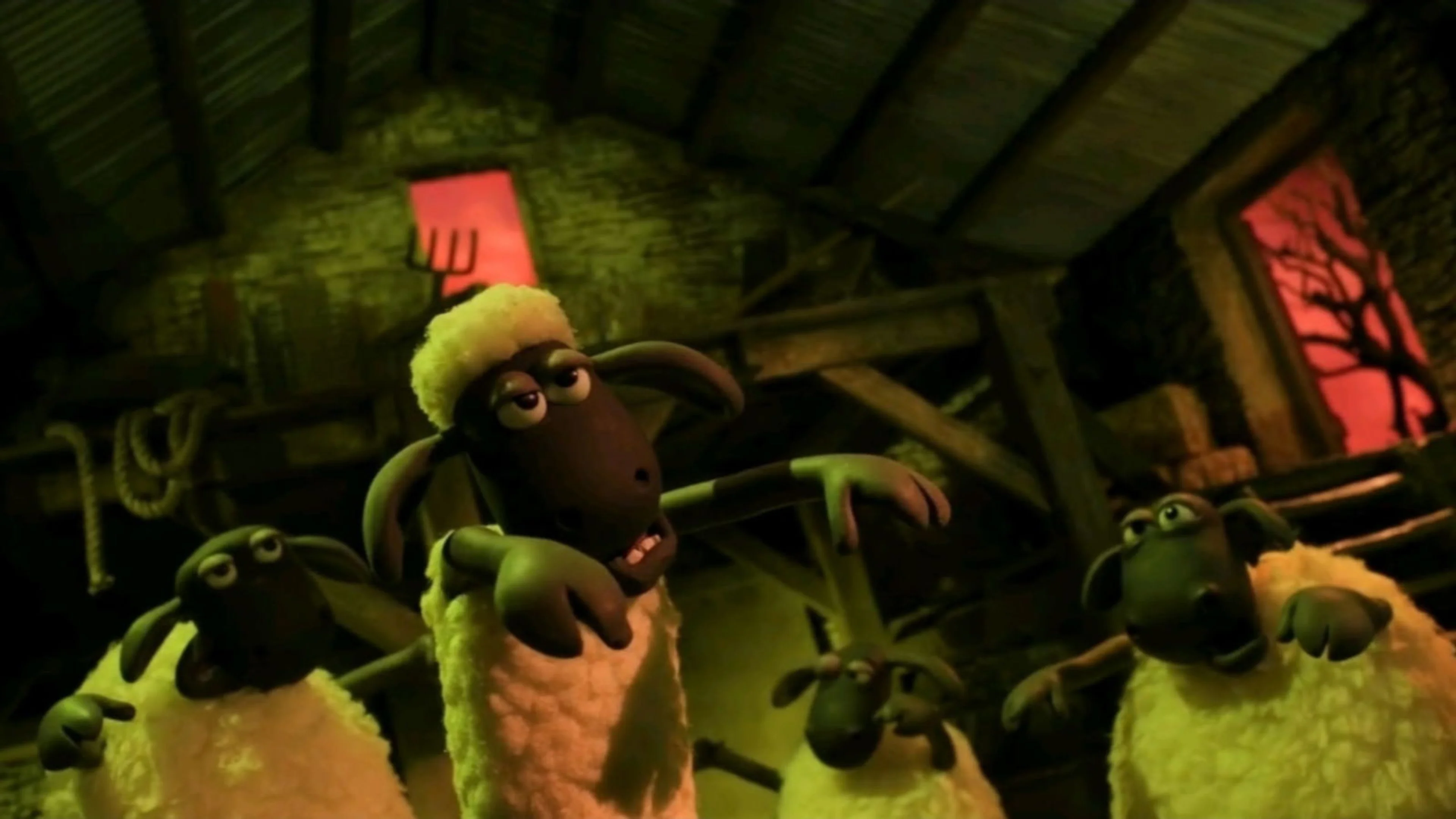The sheep stretch their arms forward in a green-lit barn.