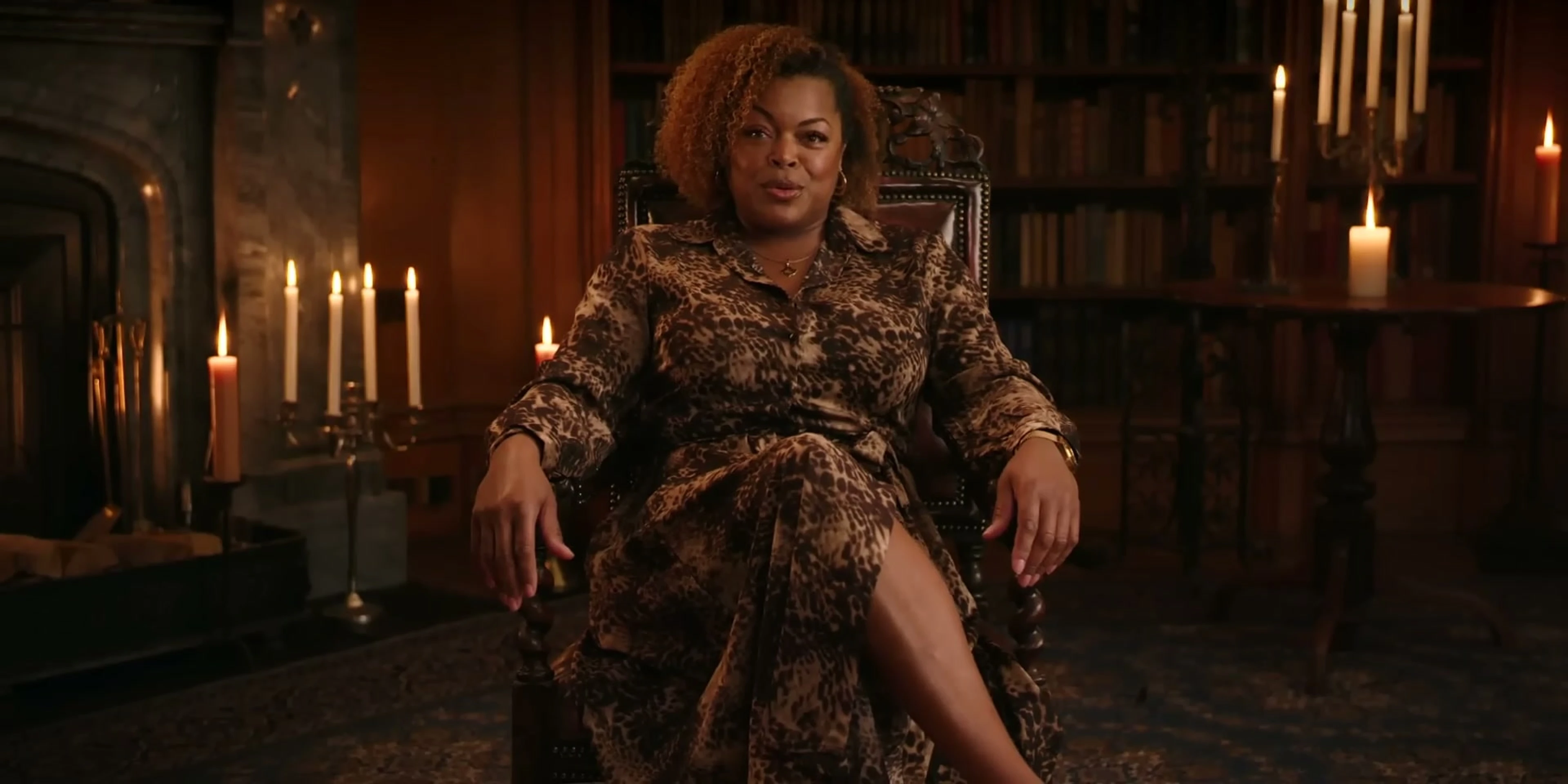 A contestant sits amid candles in The Traitors: New Blood trailer.