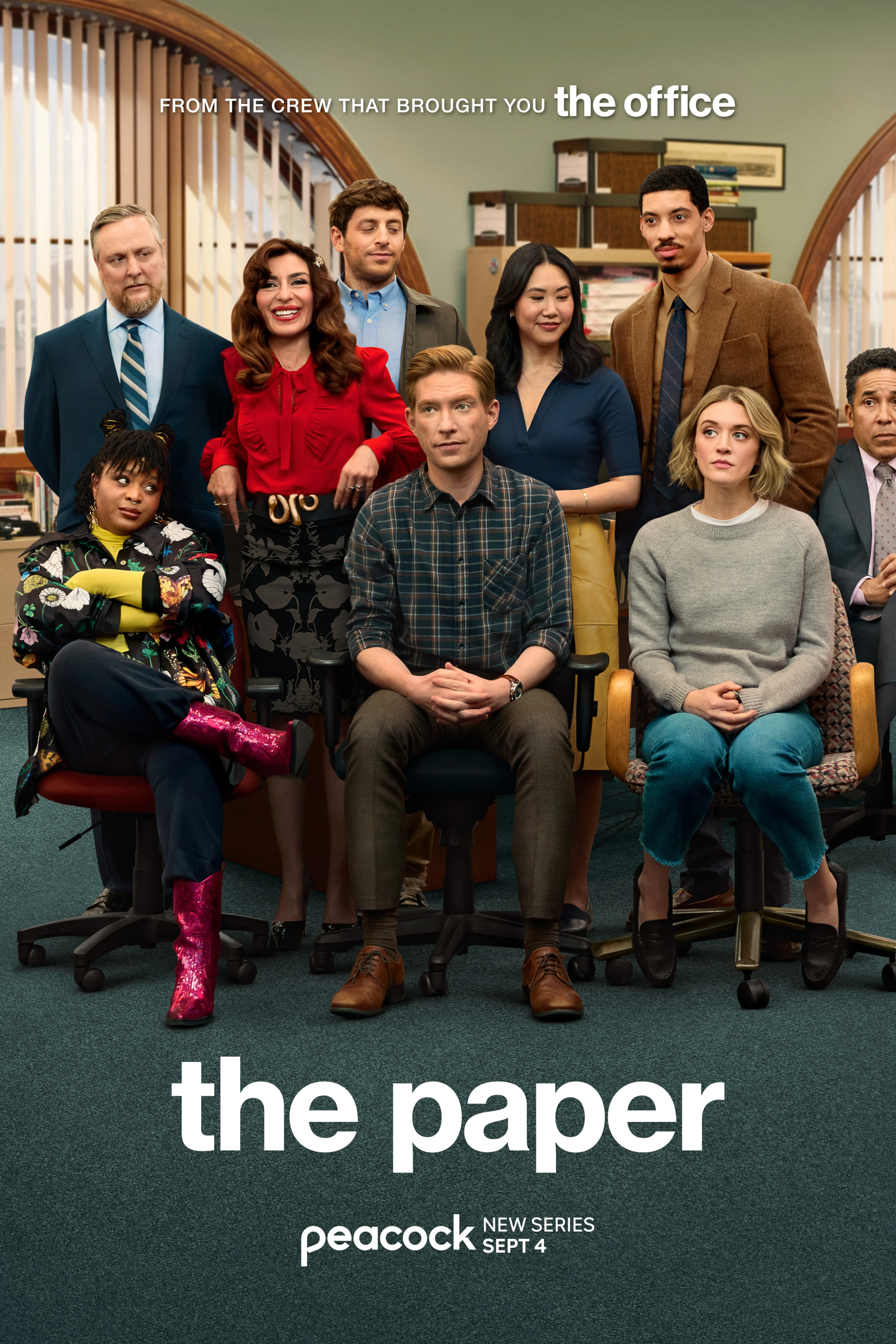 Official vertical poster for The Paper showing its newsroom cast.