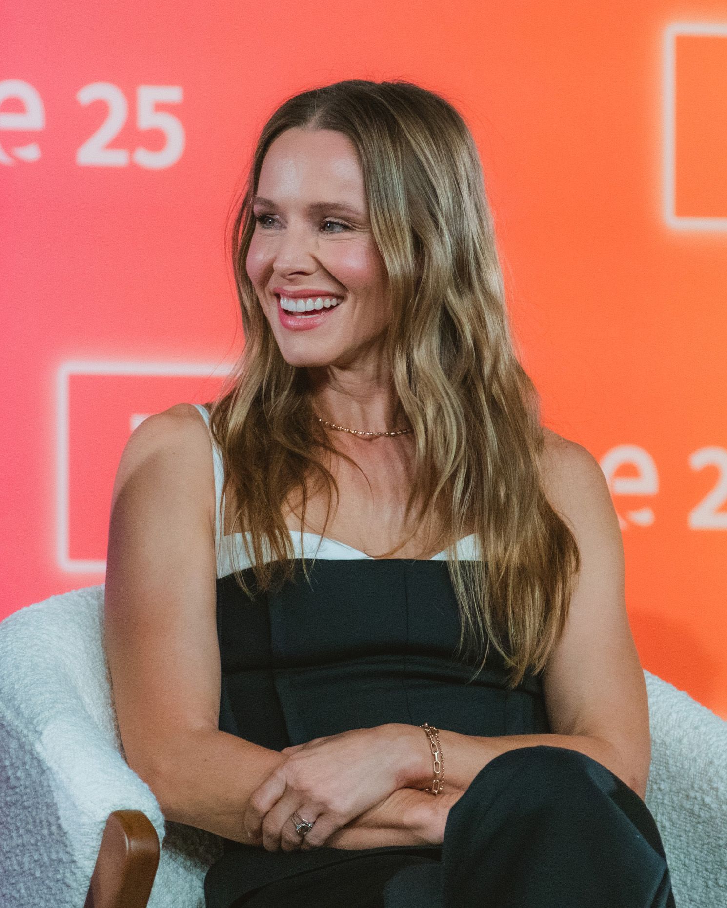 Kristen Bell smiles during a 2025 Nobody Wants This panel in Los Angeles.