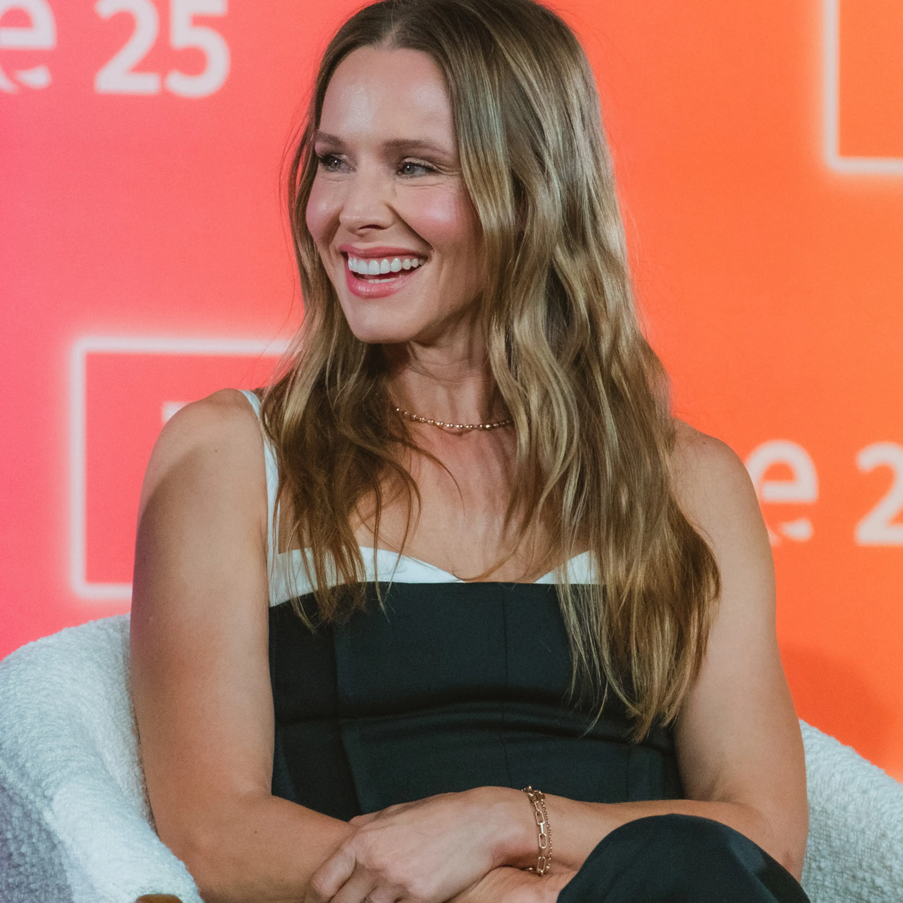 Kristen Bell smiles during a 2025 Nobody Wants This panel in Los Angeles.