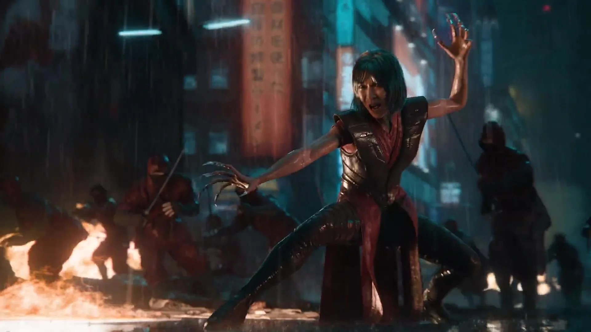 Lady Deathstrike extends her metal finger claws in a street scene from Marvel’s Wolverine.