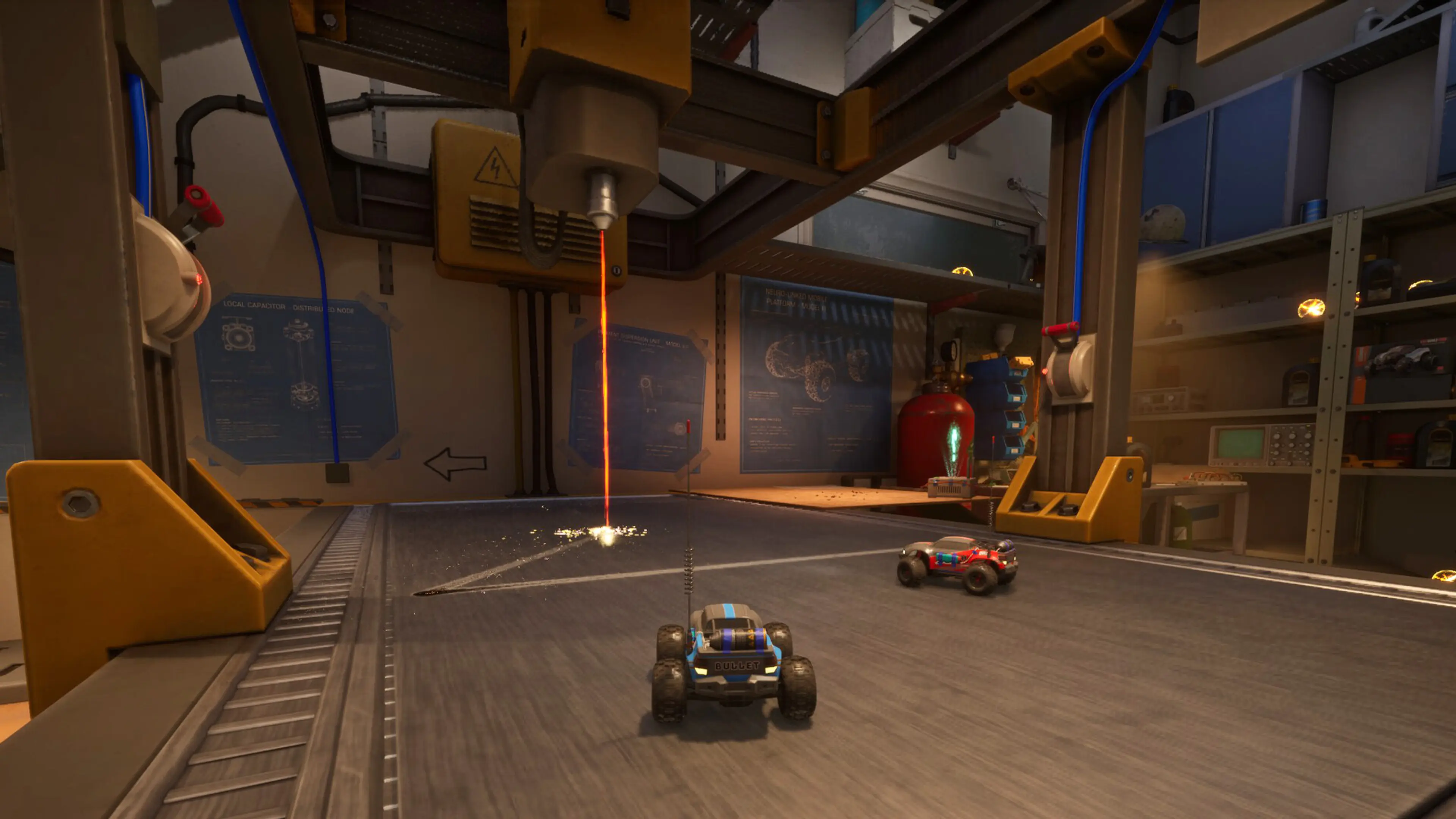 Two RC cars approach a vertical laser obstacle inside a large WheelMates workshop.