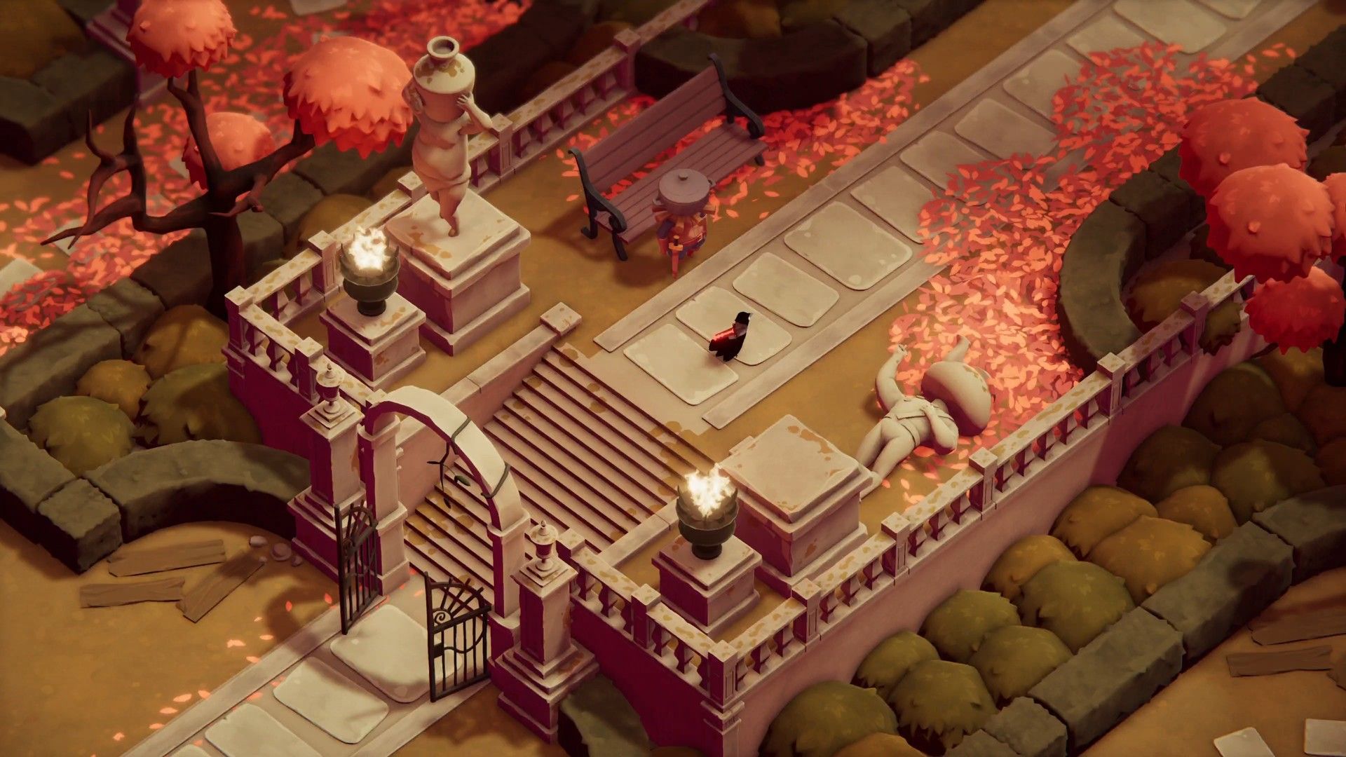 The crow crosses an autumn-coloured stone path with stairs.