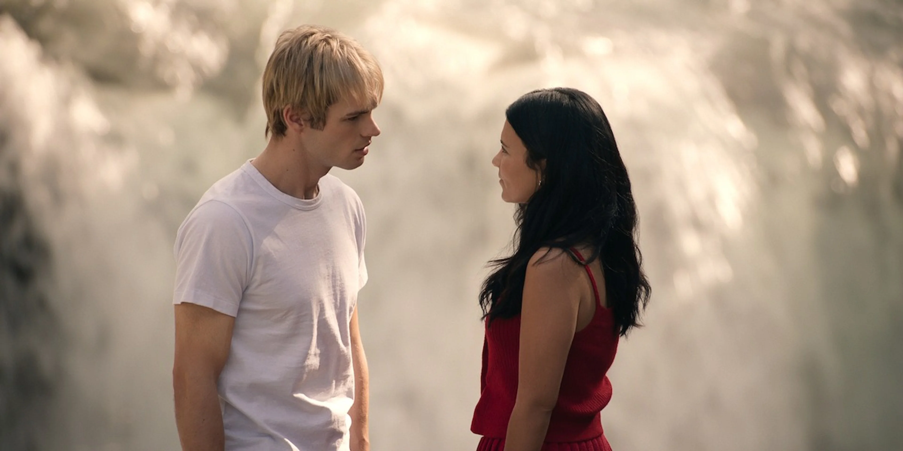 Jackie and Cole talk beside a waterfall in My Life With the Walter Boys Season 3.