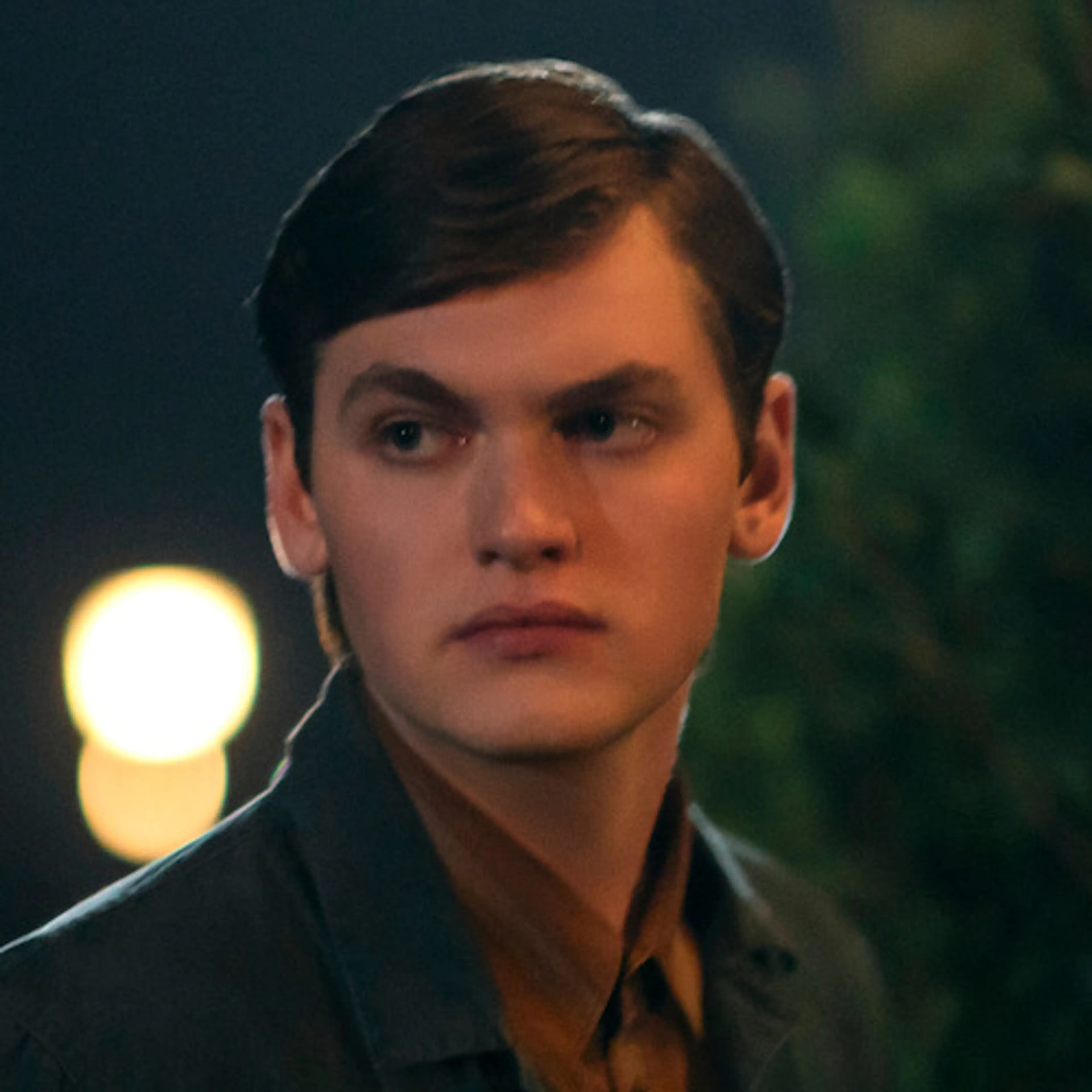Joe Anders as Aron Trask, wearing a dark jacket outdoors in East of Eden.