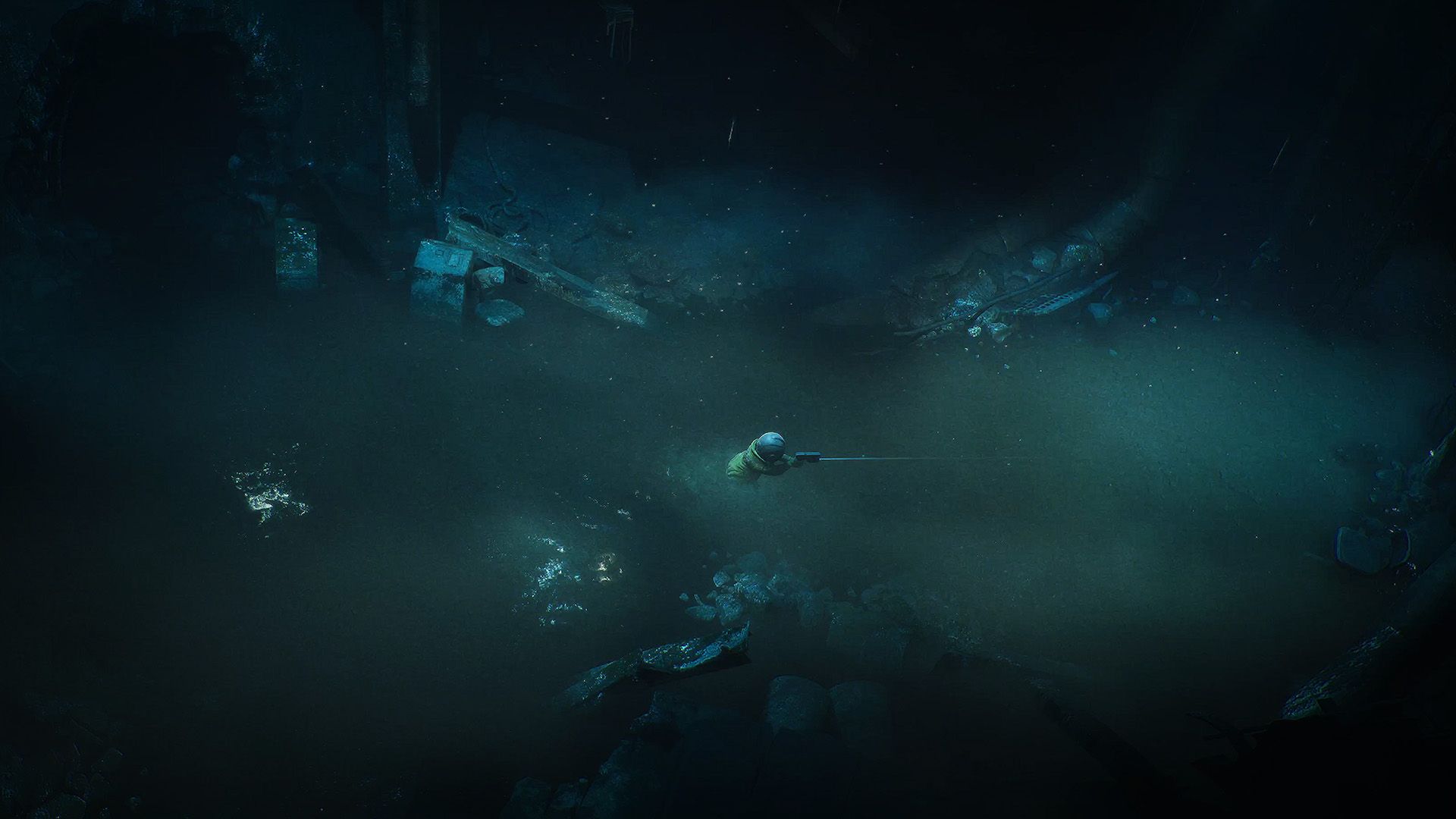 Cel aims a weapon in a dark flooded room.