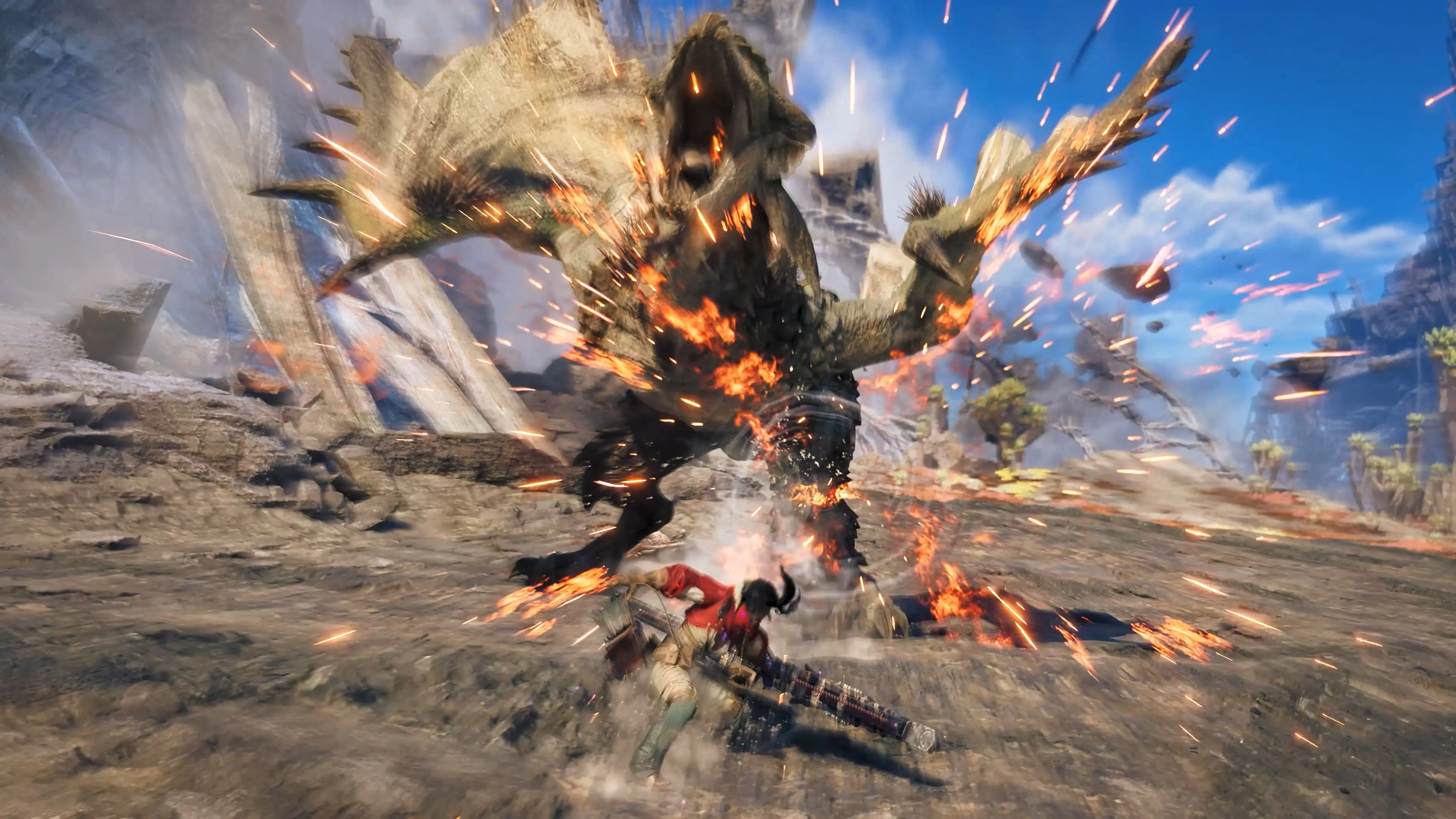 A monster recoils amid fire and sparks from a hunter’s Boosted Action in Ascendance.