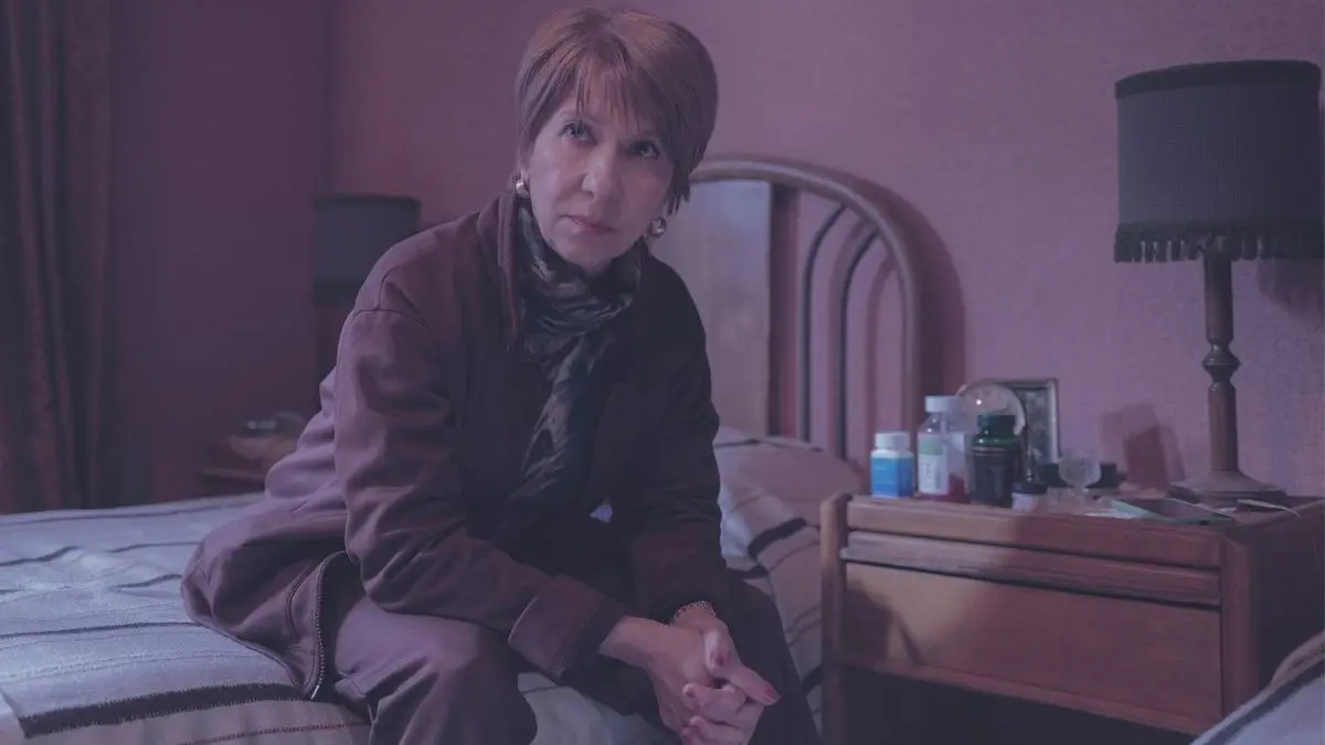 Mercedes Morán as Ema sits in a bedroom in My Sad Dead.