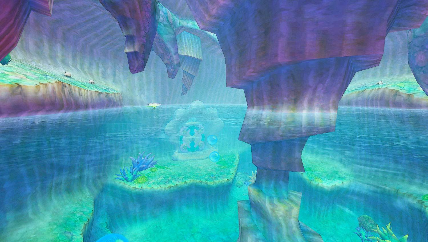 Blue water surrounds rock columns and submerged plants in Floria.