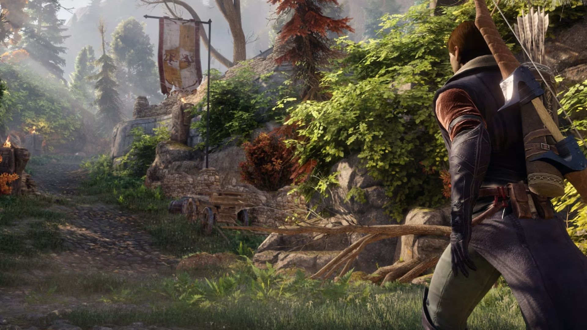 An archer looks down a green path through woodland and stone ruins.