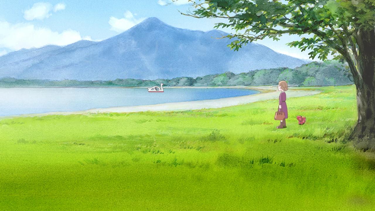 Sophie looks out across a Fukushima lakeside landscape.
