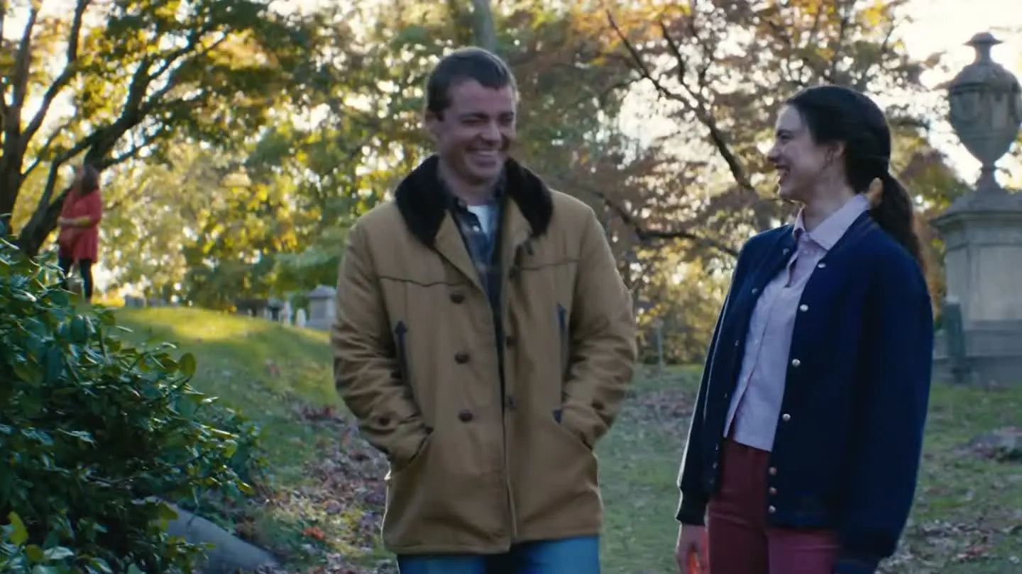 Maya and Charlie smile together outdoors in Love of Your Life.