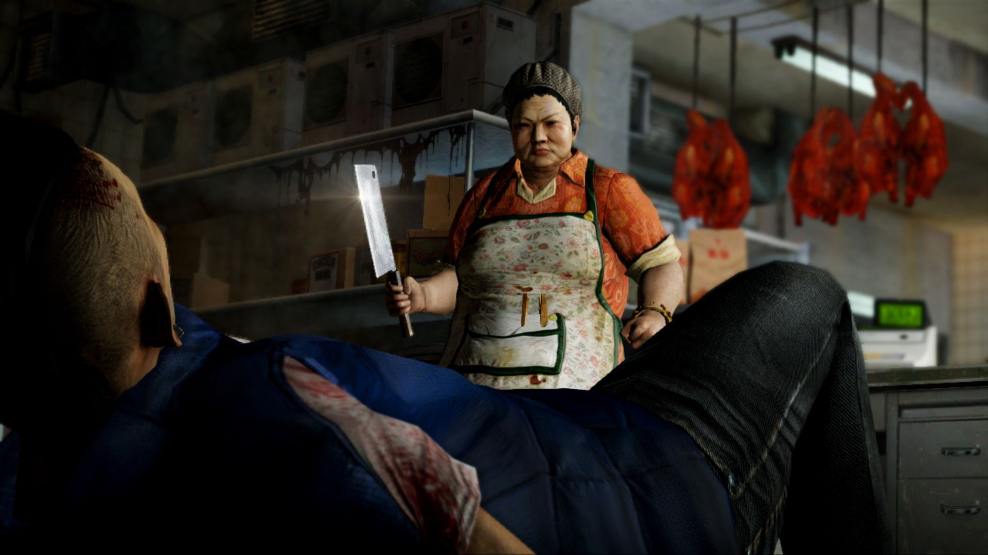 A woman holds a cleaver across from an injured man inside a food shop.