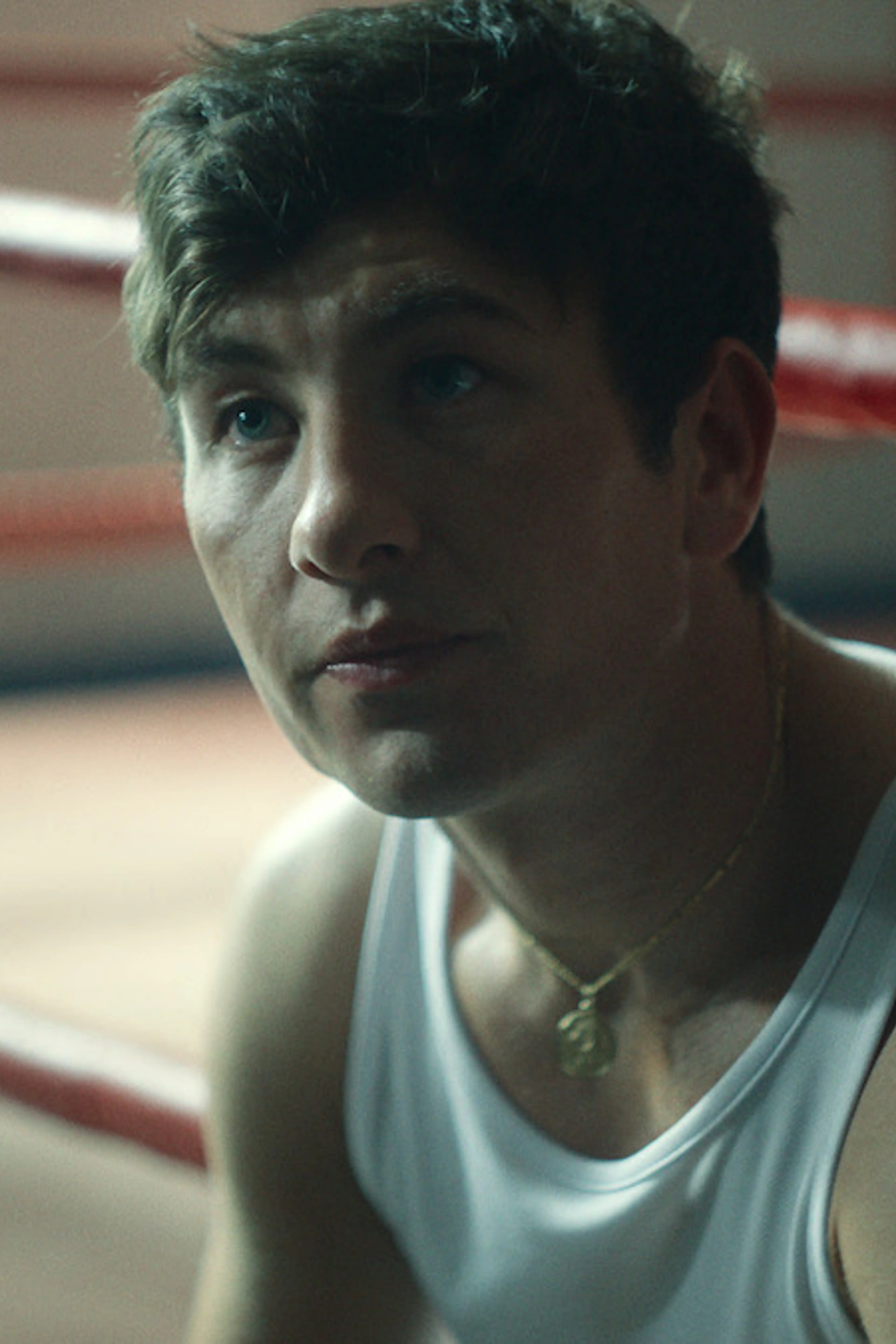 Barry Keoghan as Jonny McGee sits inside a boxing ring in Top Boy.