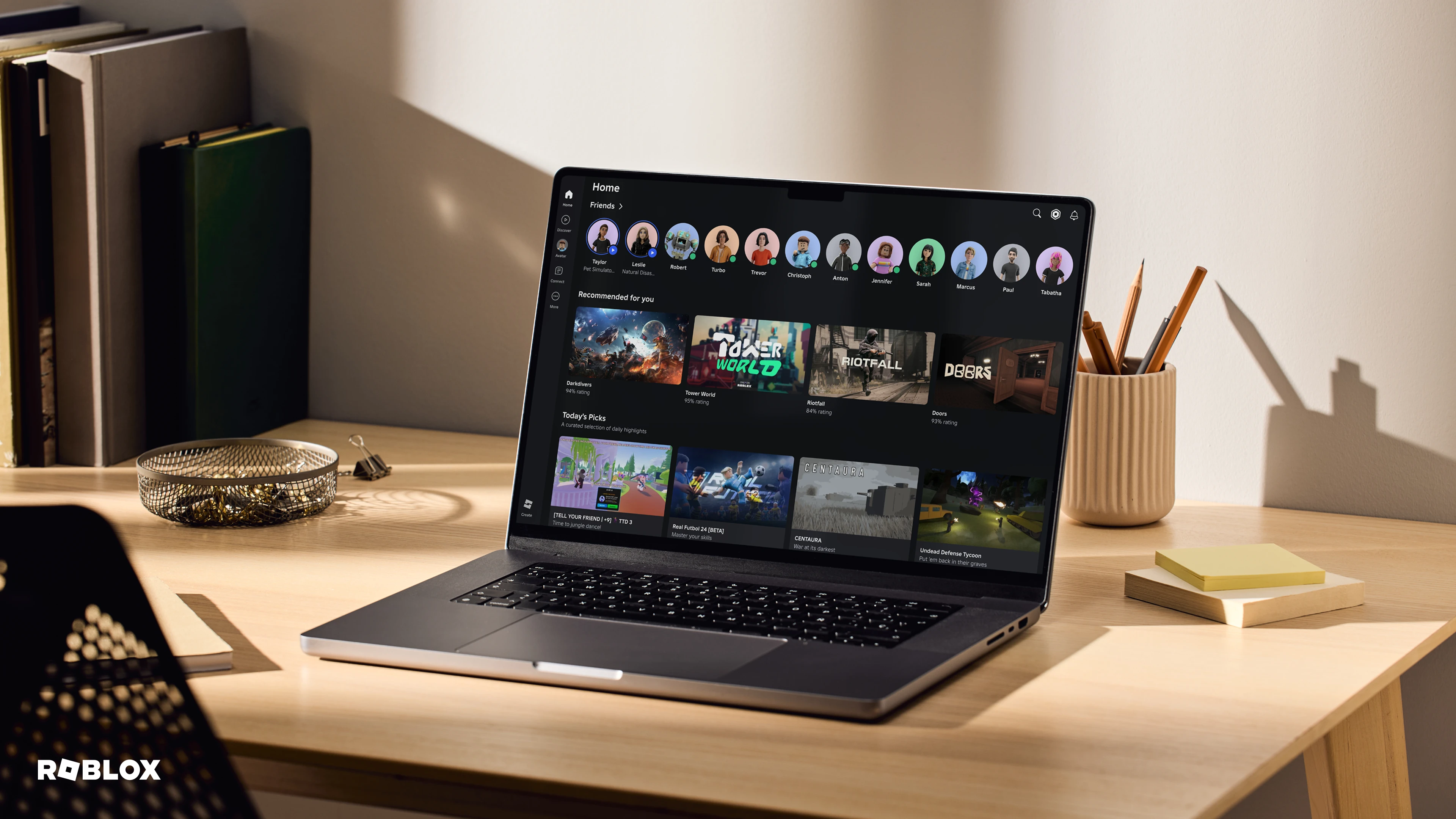 The Roblox Recommended for You home page displayed on a laptop.