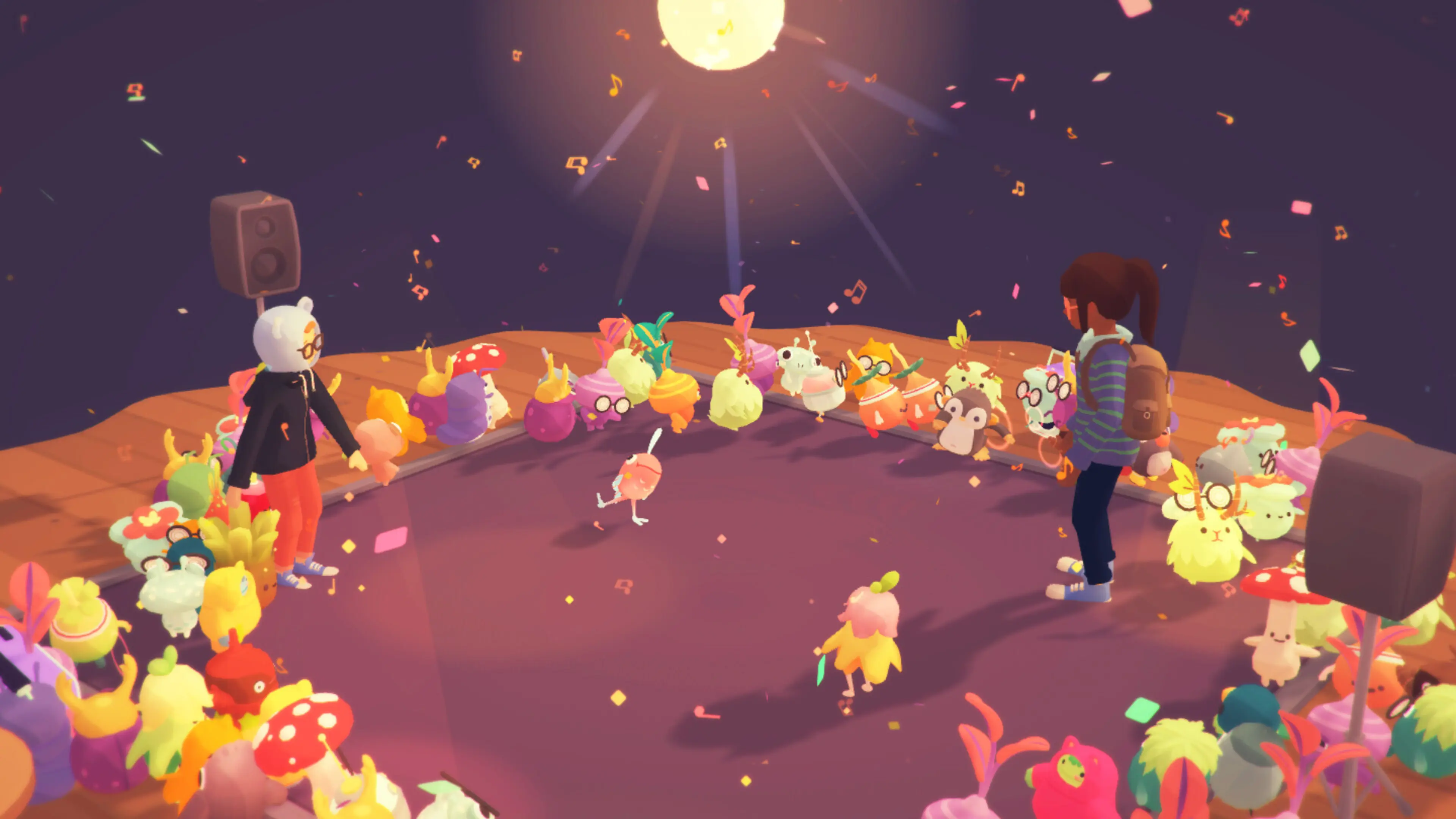 Ooblets gathered around a glowing dance floor at night.