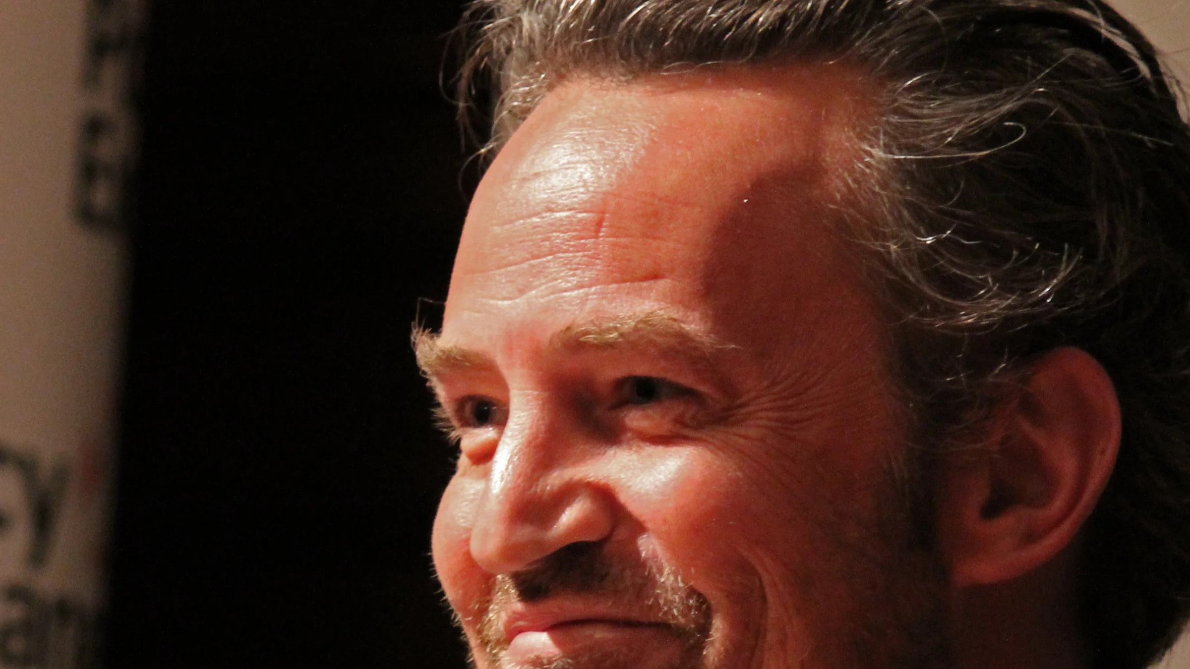 Matthew Perry smiles during a 2013 discussion about problem-solving courts.