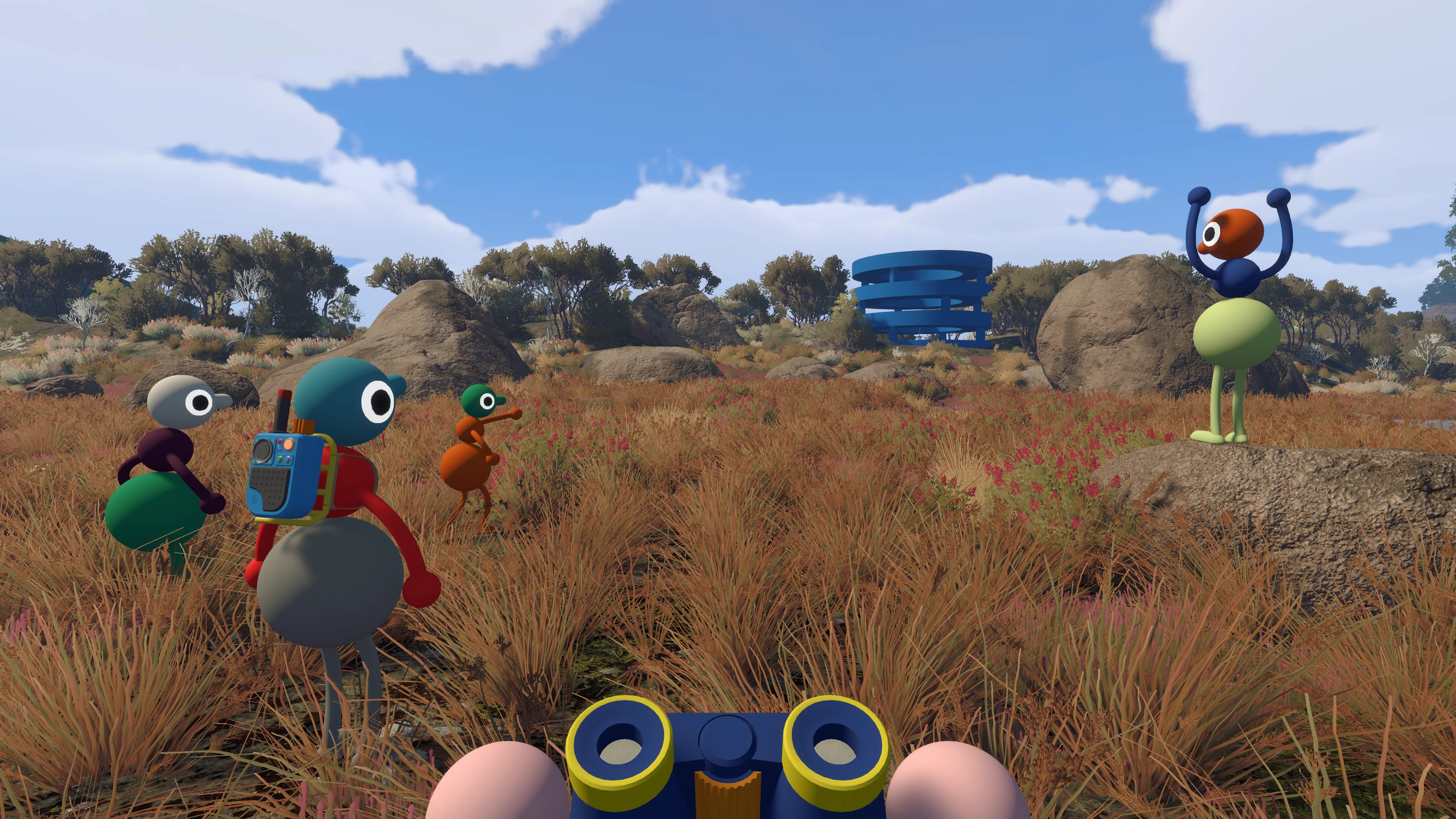 A Big Walk player uses binoculars to watch friends across a grassy area.