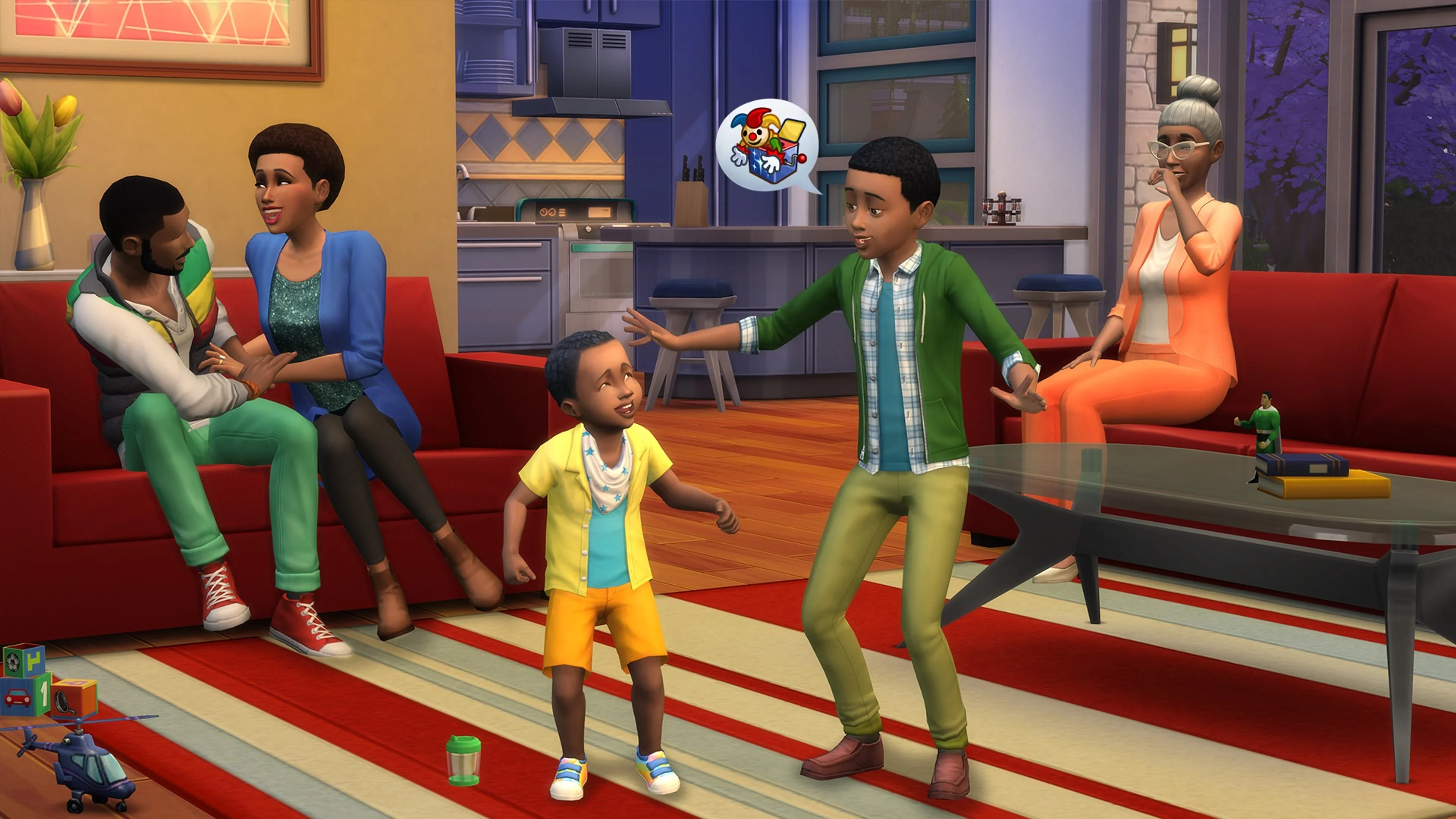 Official The Sims 4 gameplay image with several family members talking and playing in a living room, with a kitchen, sofa and book on a table visible.