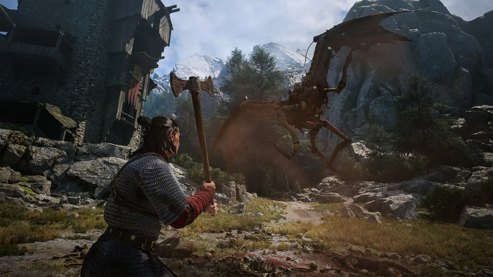 Coen faces a huge winged creature in a mountain settlement in The Blood of Dawnwalker.