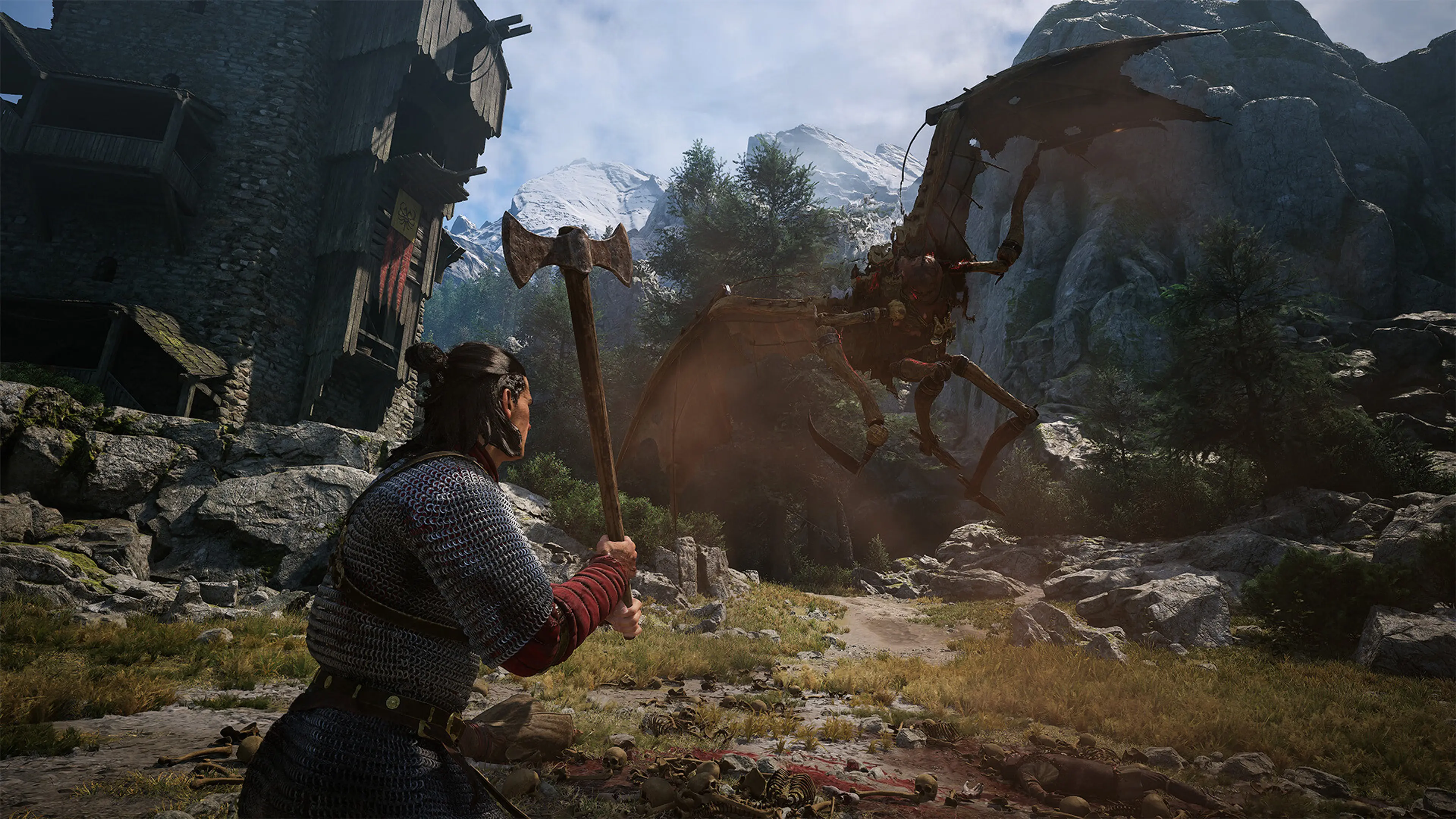 Coen faces a huge winged creature in a mountain settlement in The Blood of Dawnwalker.