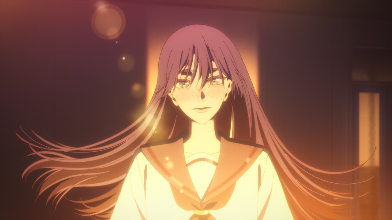 Jun’s long hair and freckles are visible in a warm-lit BLESS scene.