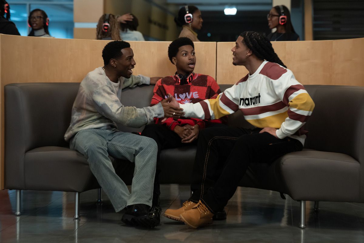 Three male students from Netflix’s A Different World stand together.