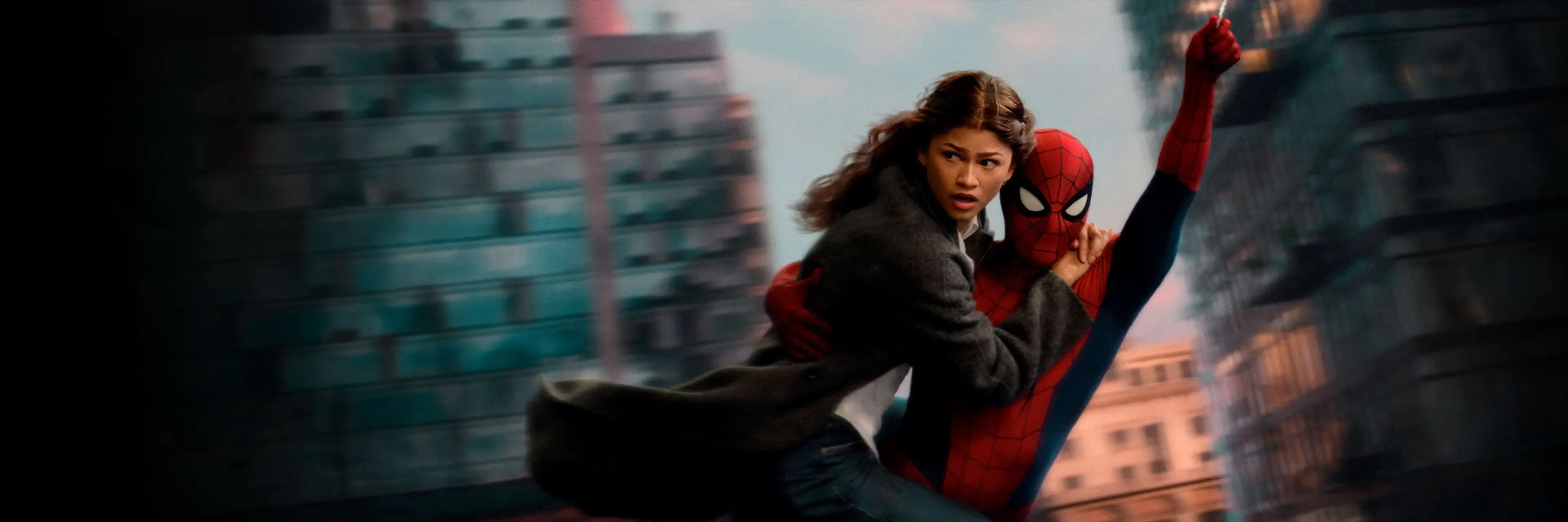 Spider-Man swings between New York buildings in Spider-Man: Brand New Day.